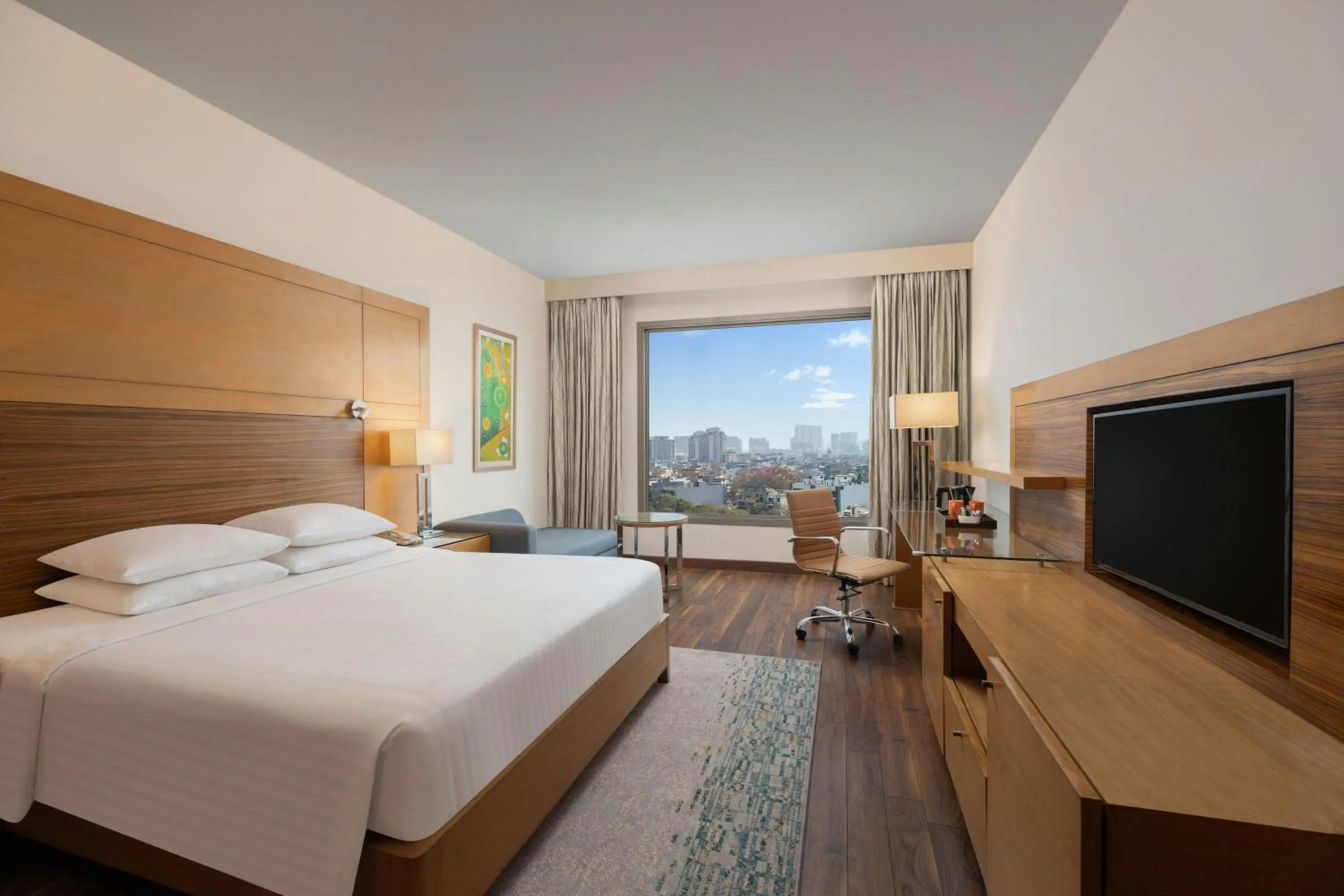 Photo of the whole room, Bed in Courtyard by Marriott Gurugram Downtown