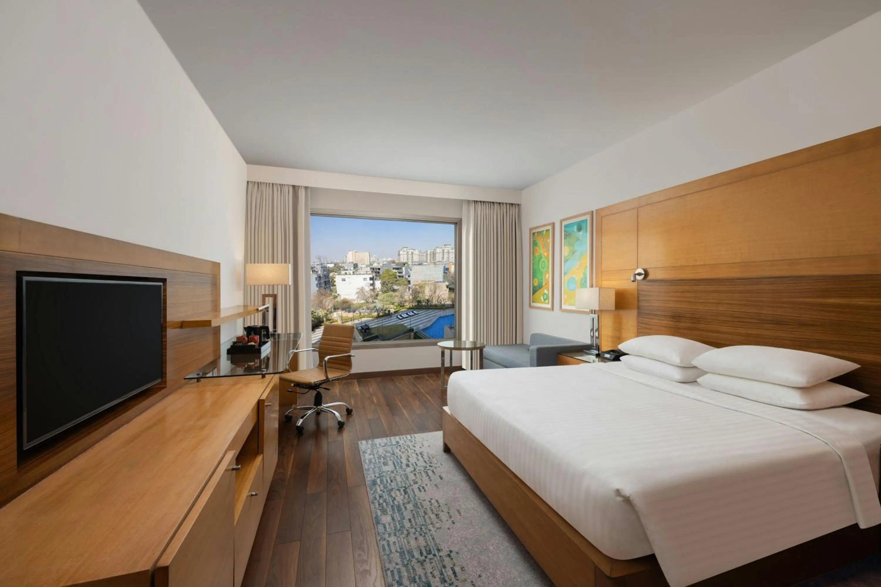 Swimming pool, Bed in Courtyard by Marriott Gurugram Downtown