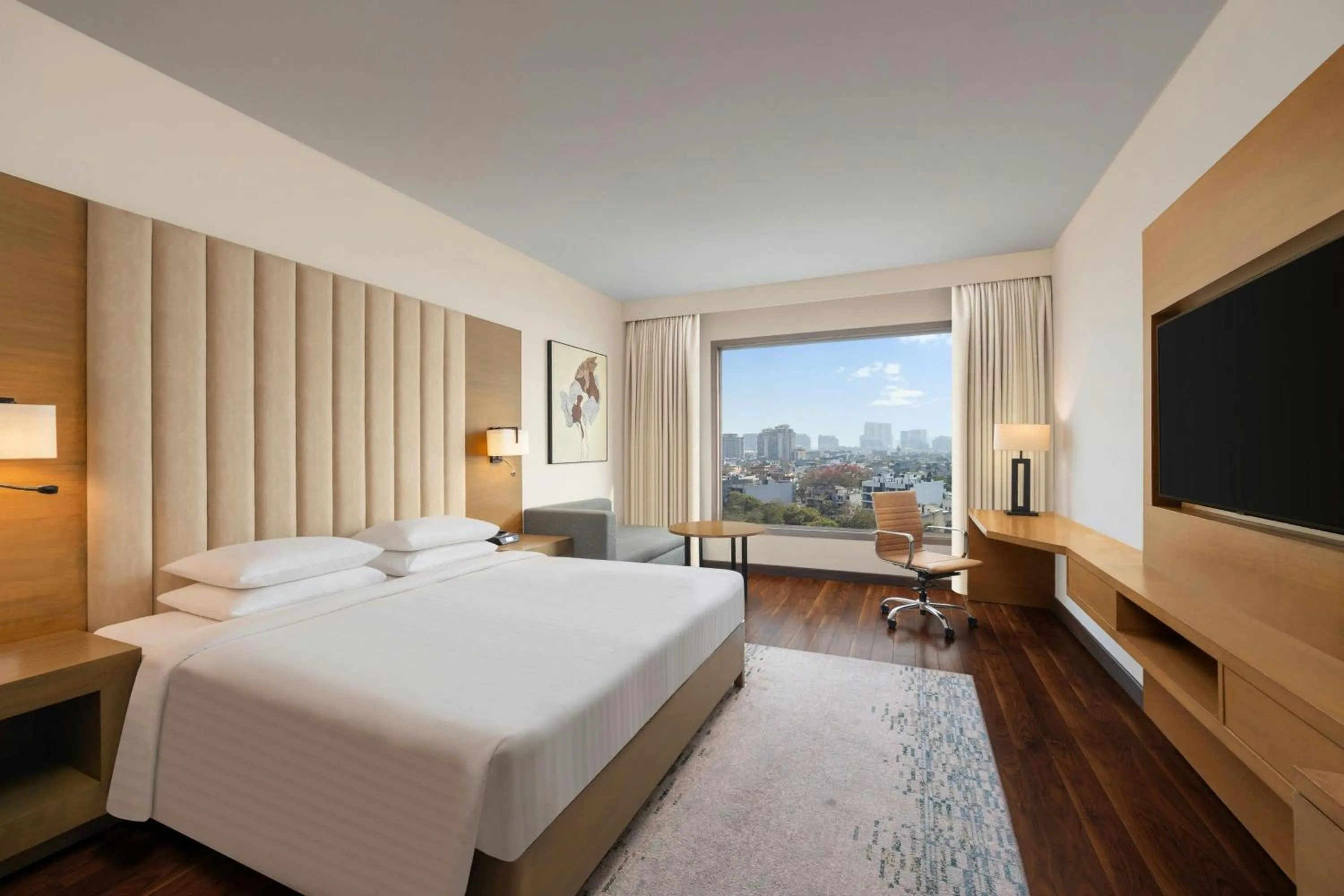 Photo of the whole room, Bed in Courtyard by Marriott Gurugram Downtown