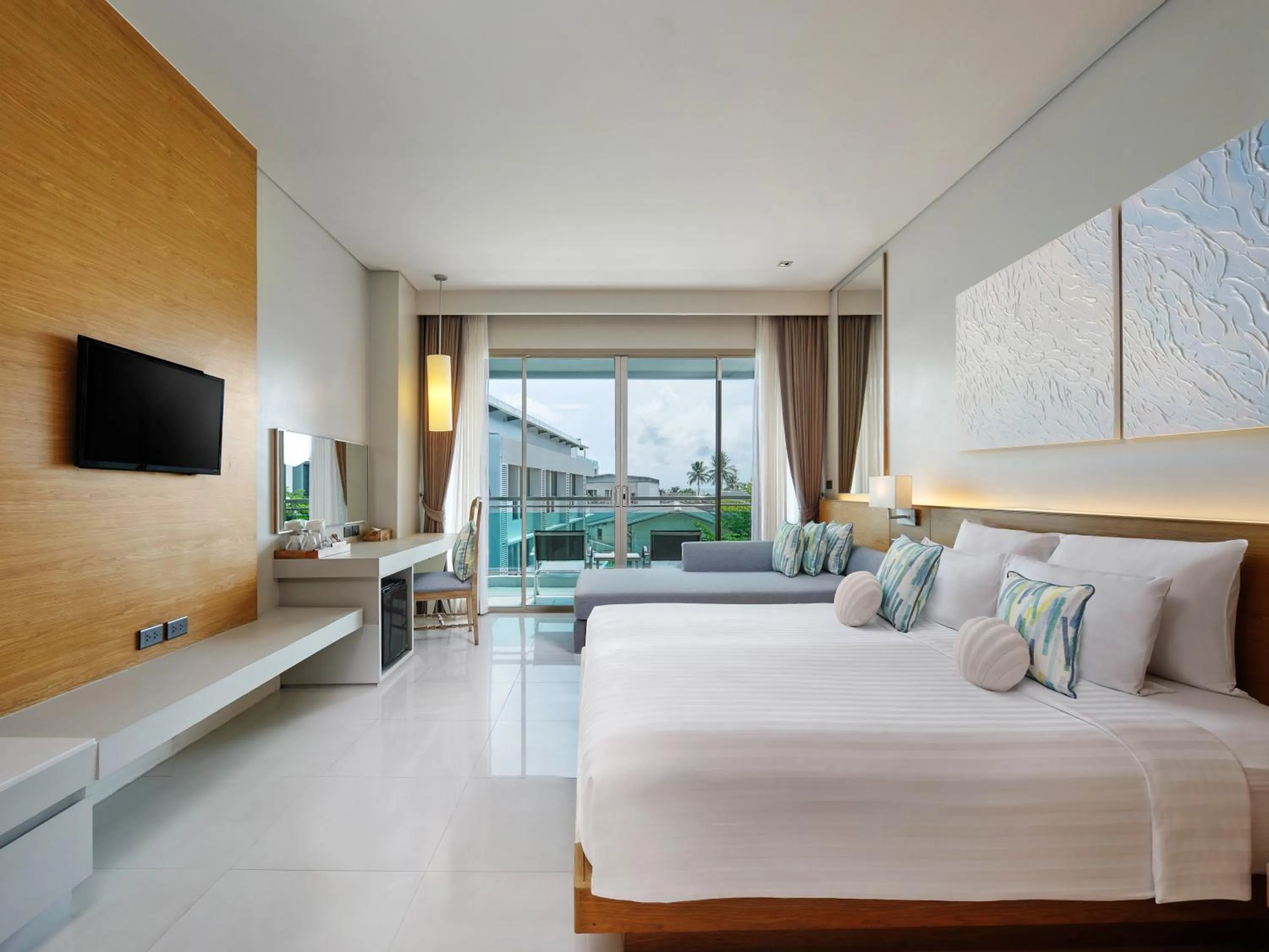 Bed in The Kee Resort & Spa