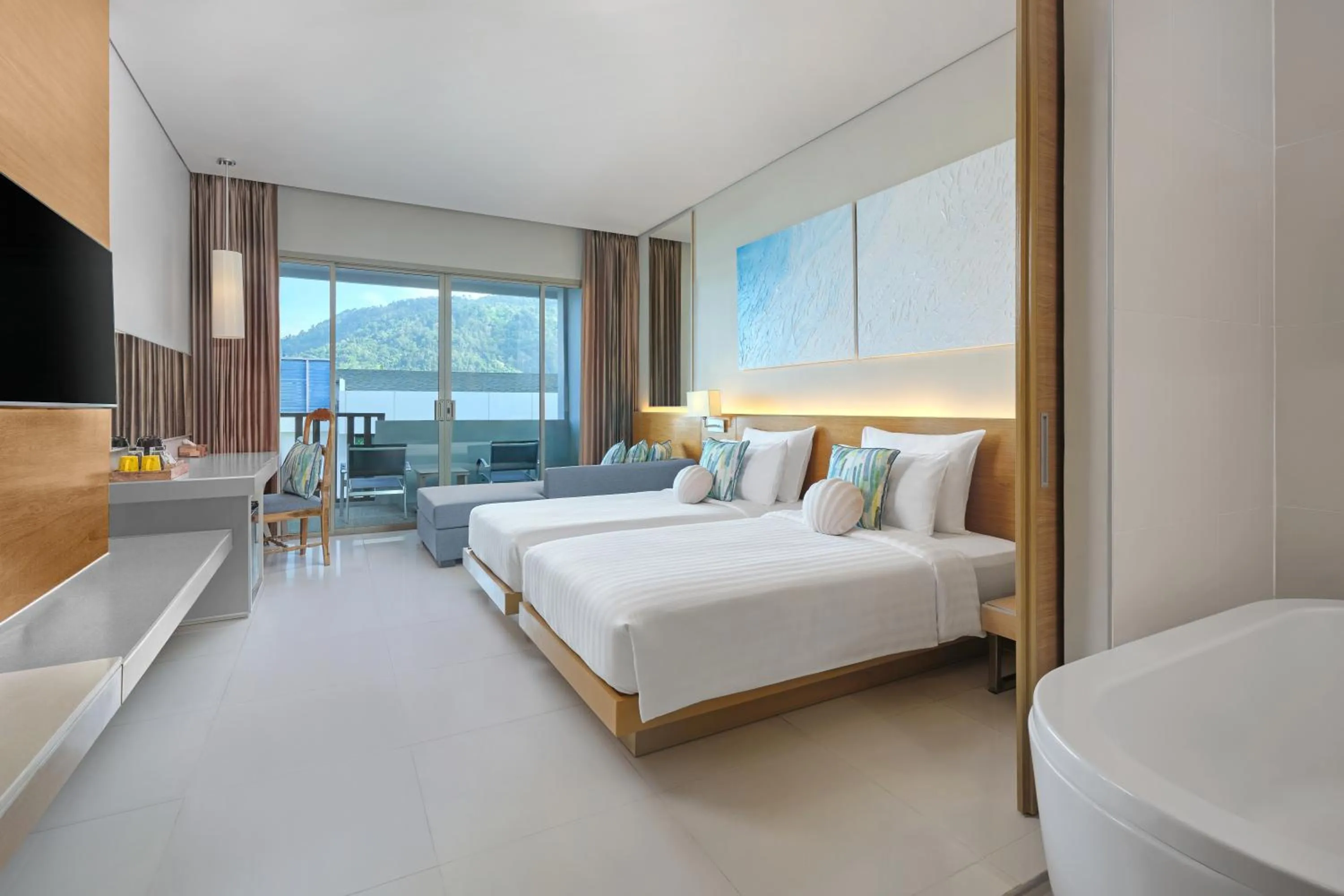 Bed in The Kee Resort & Spa