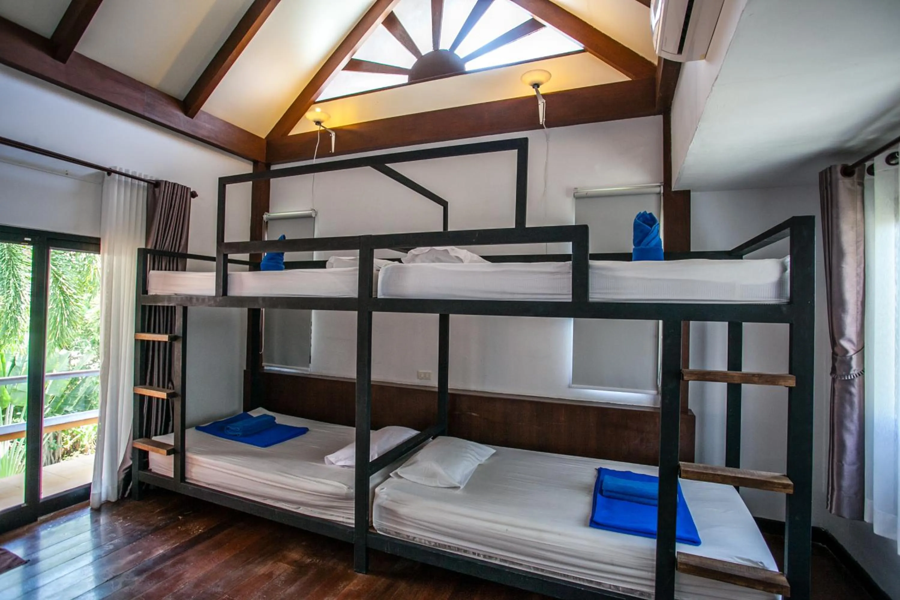 Bed in Phitharom PP Resort