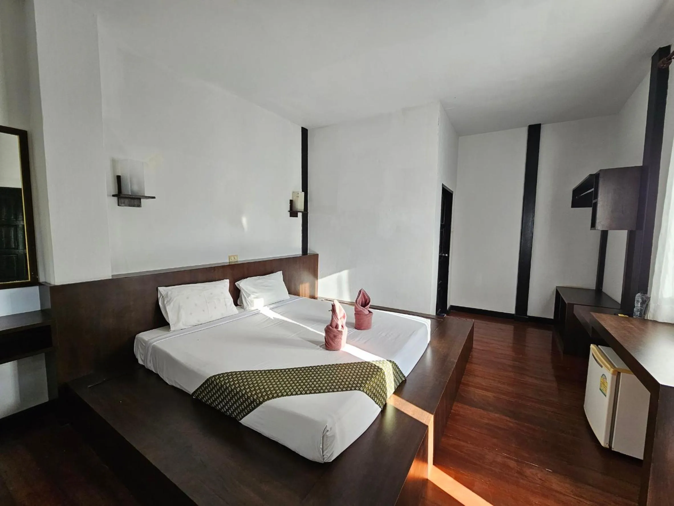 Bed in Phitharom PP Resort