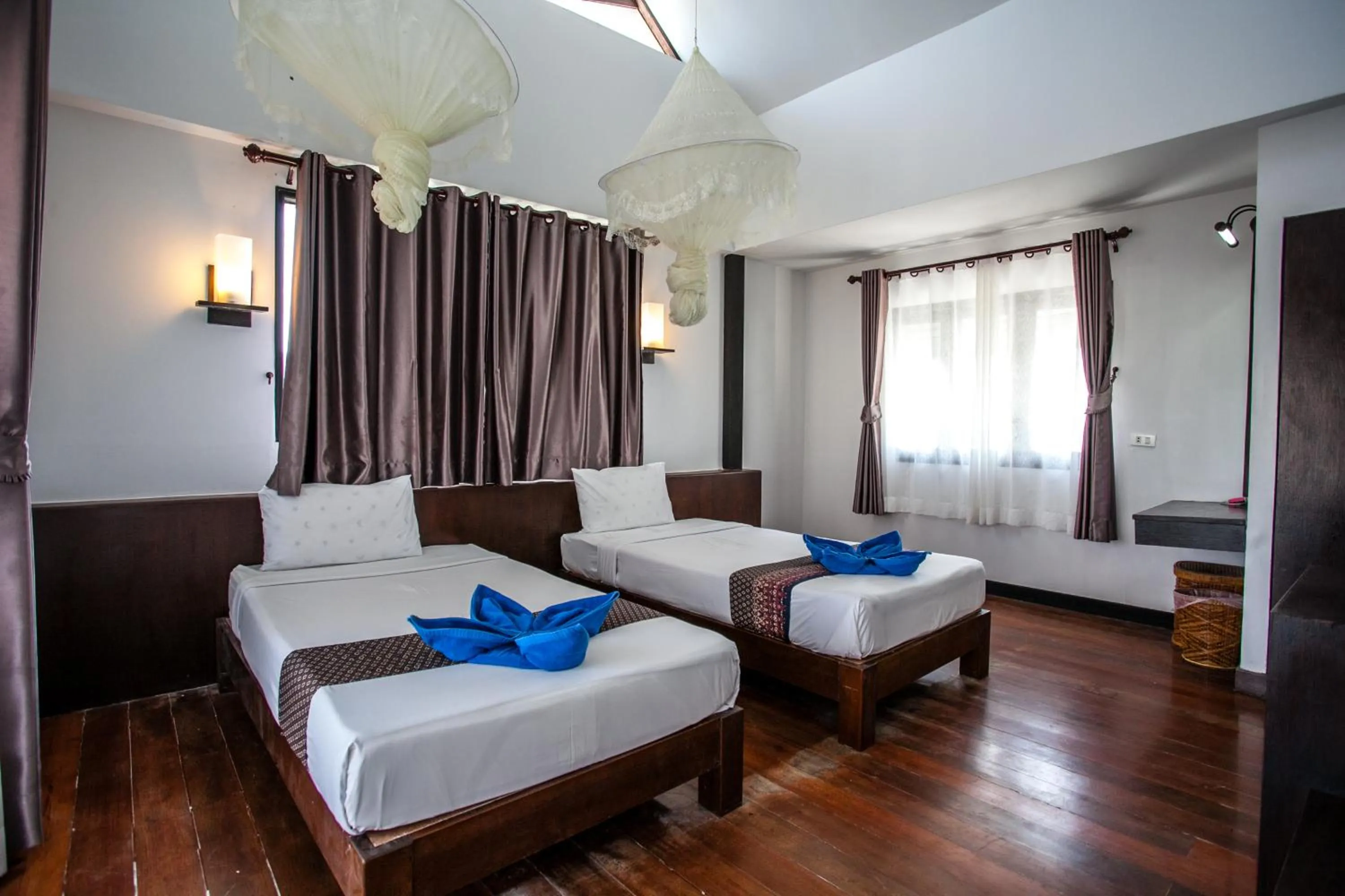 Bed in Phitharom PP Resort