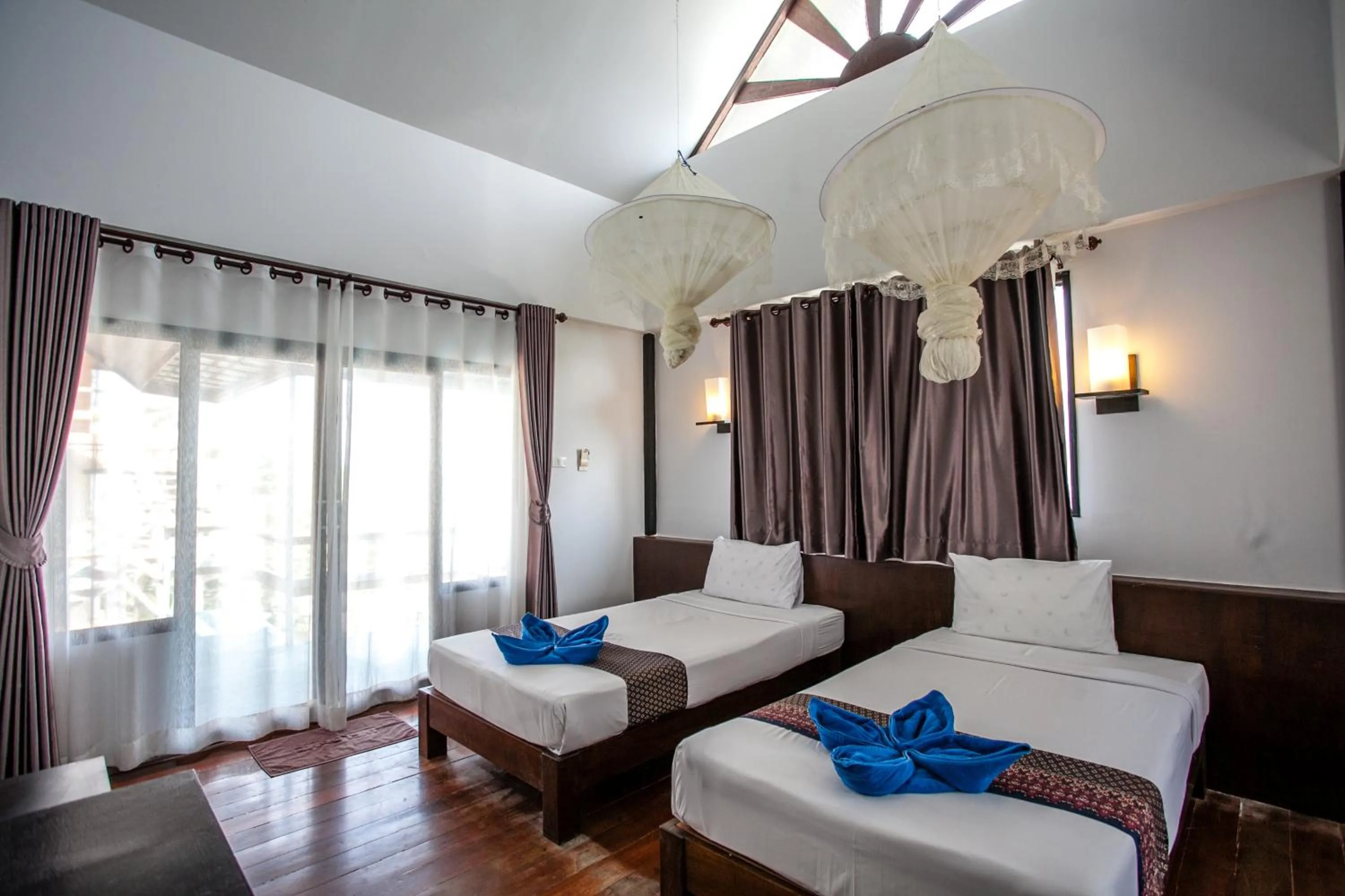 Bed in Phitharom PP Resort