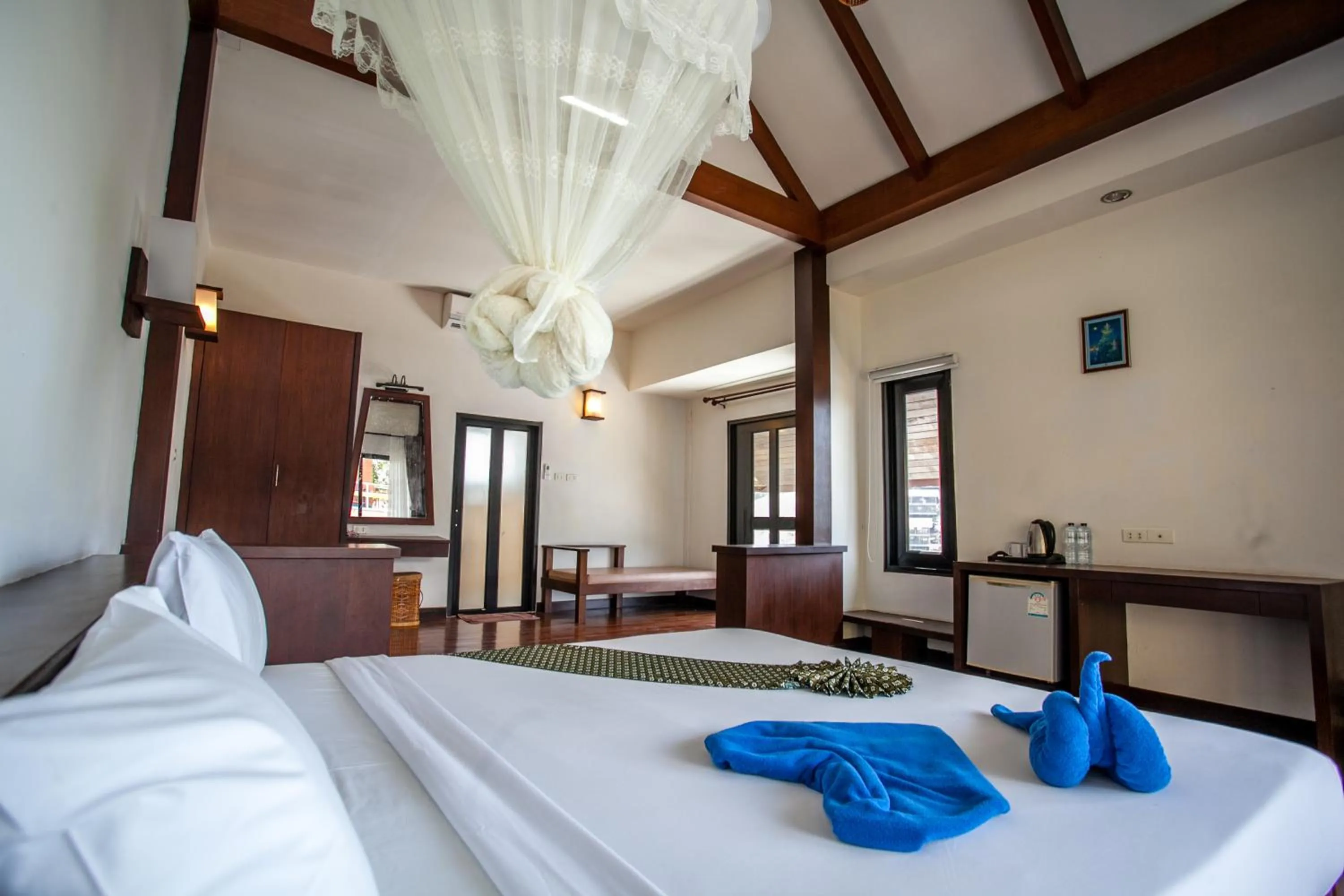 Bed in Phitharom PP Resort