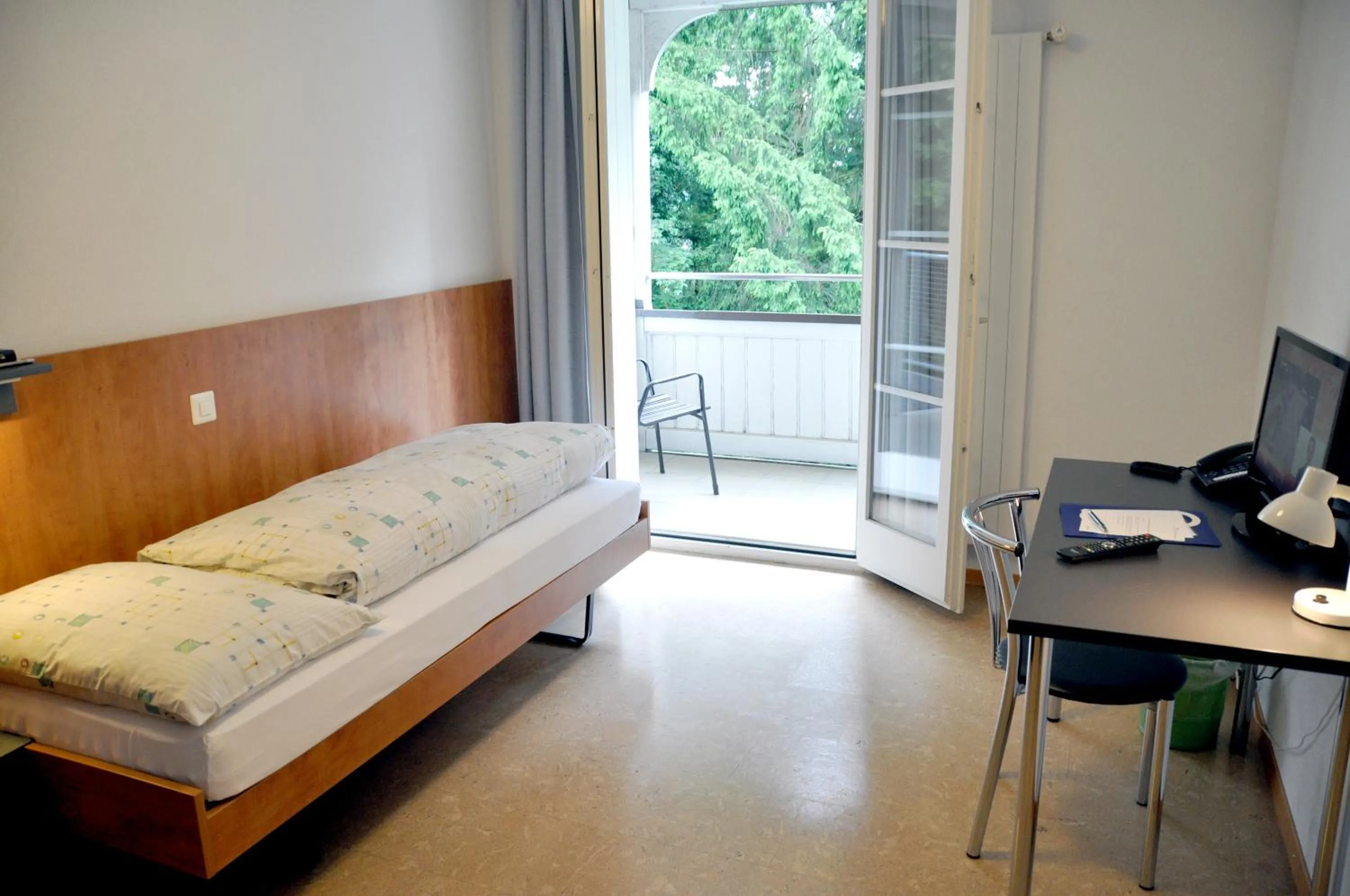 Photo of the whole room, Bed in Bienenberg - Das Genusshotel im Grünen - Liestal