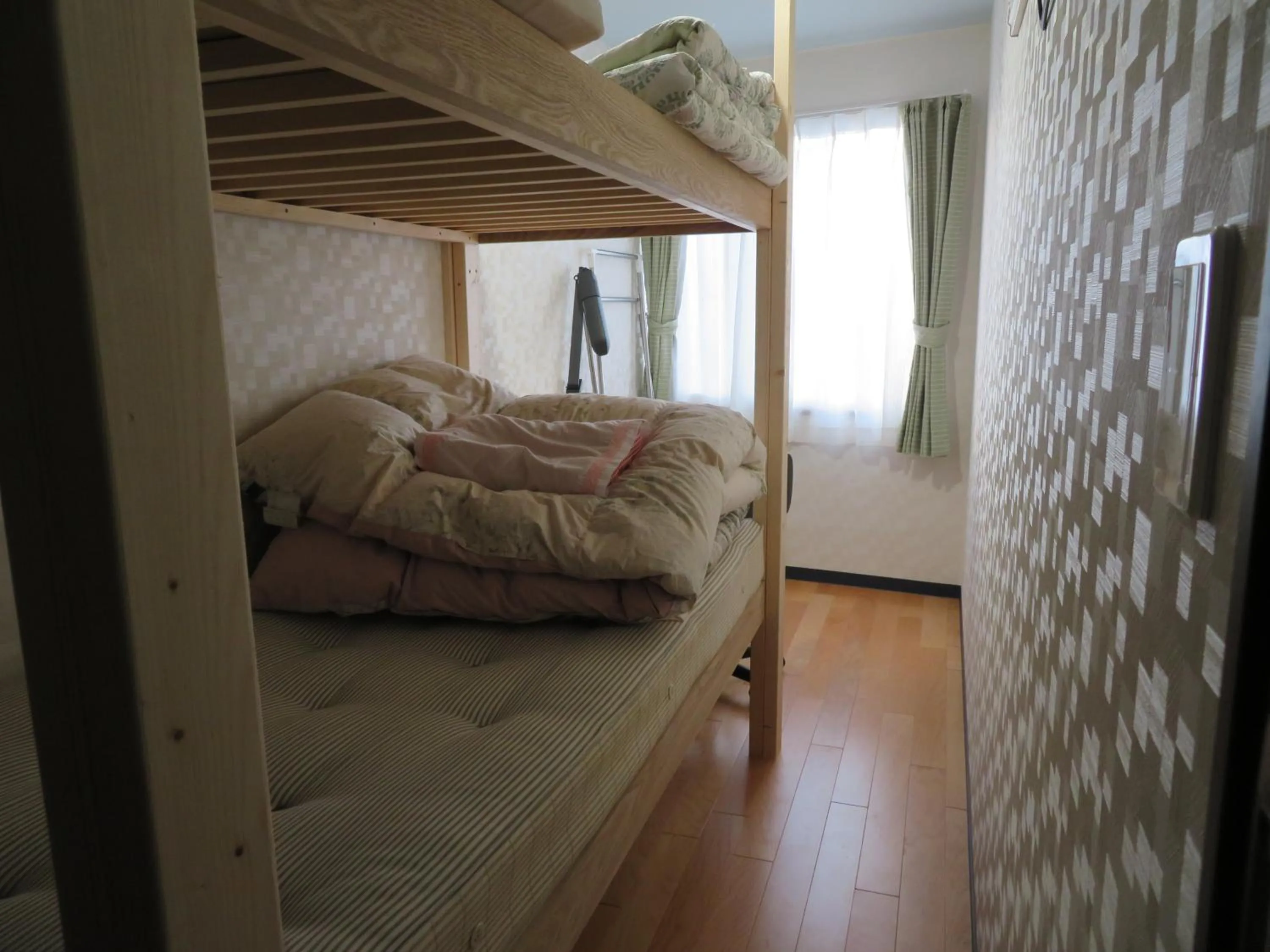 Bedroom, Bed in Sapporo Guest House Nariya