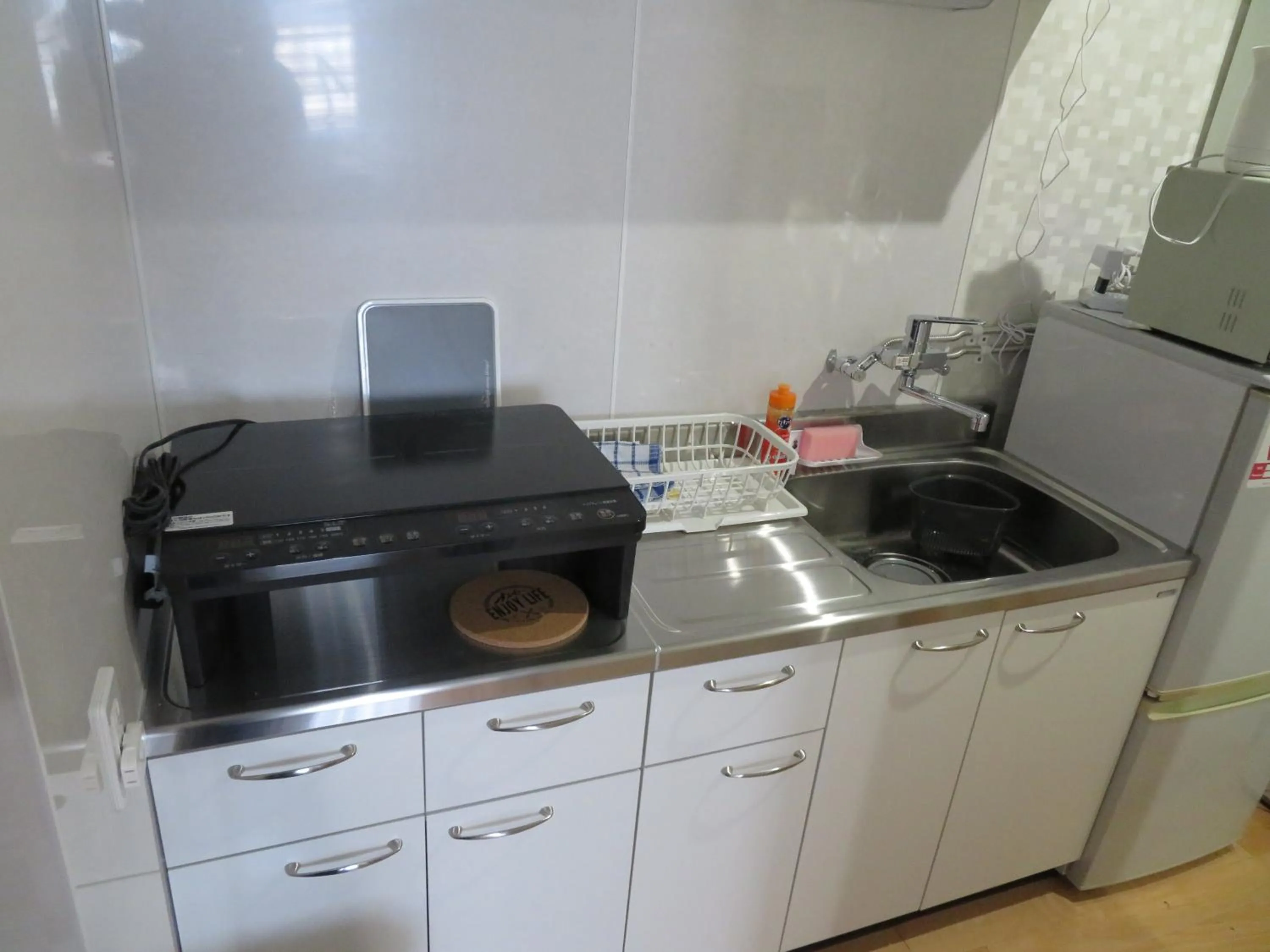 Kitchen or kitchenette in Sapporo Guest House Nariya