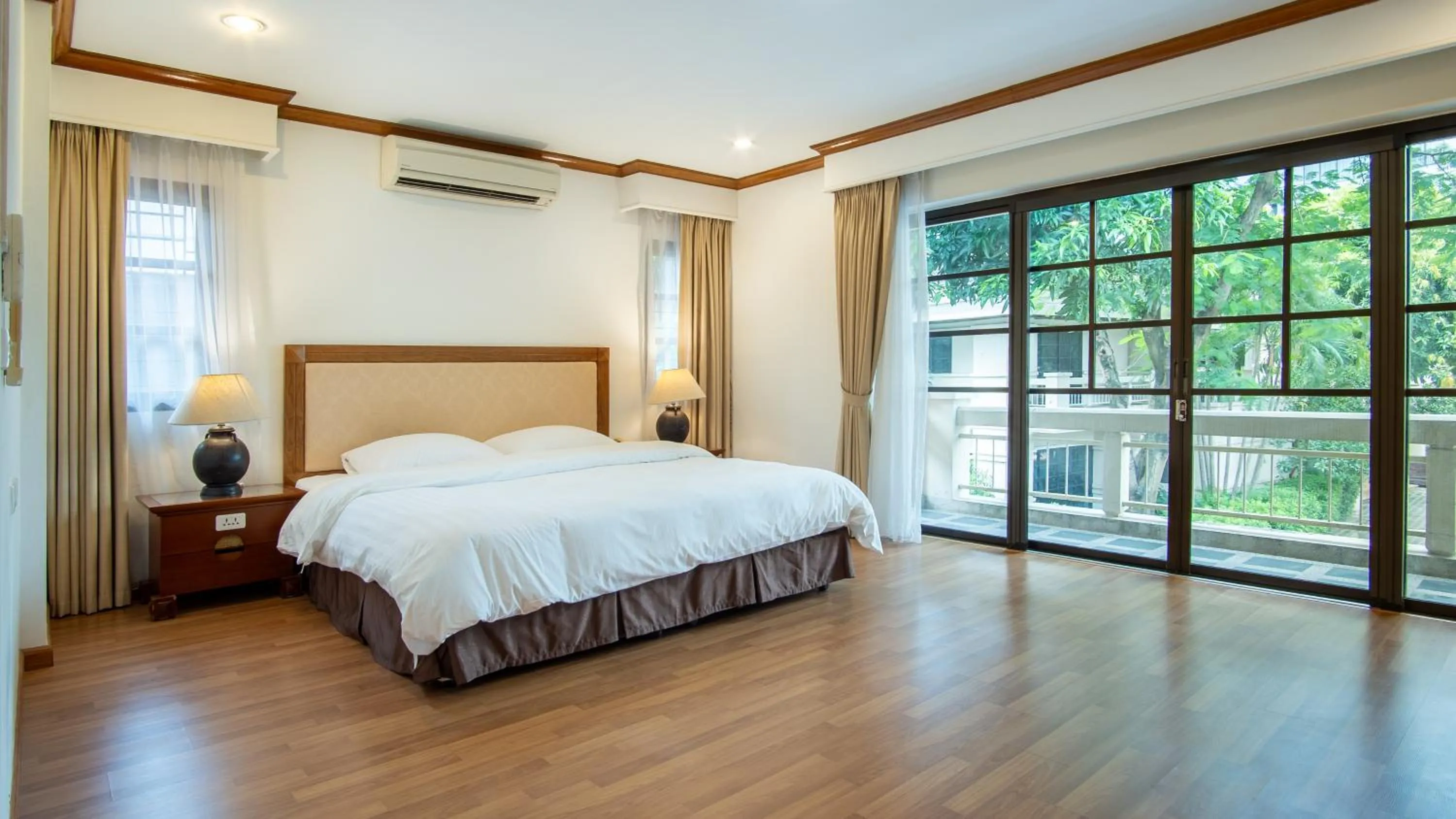 Bed in Oriental Palace Apartments Hanoi