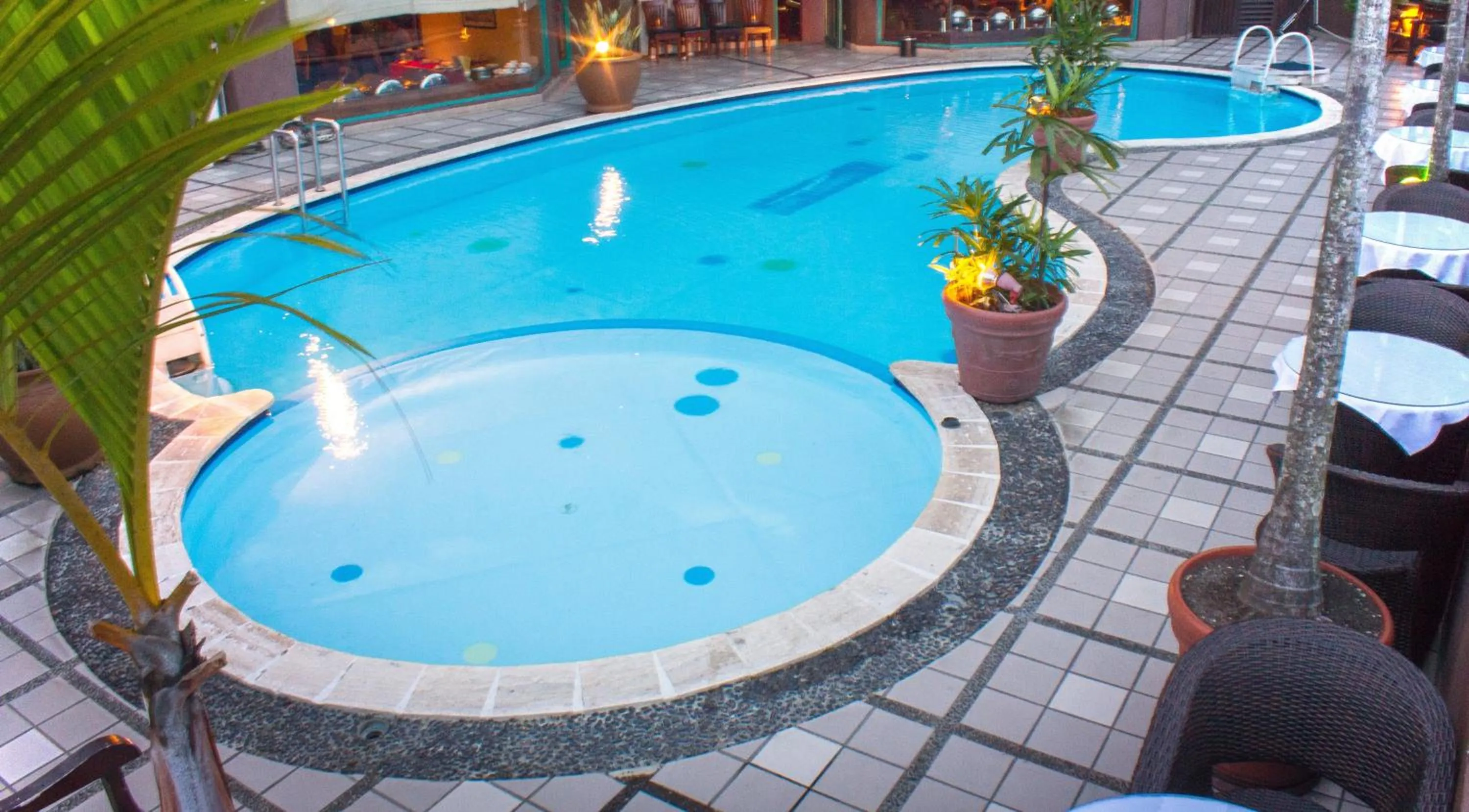 Swimming pool in Travellers Suites Serviced Apartments