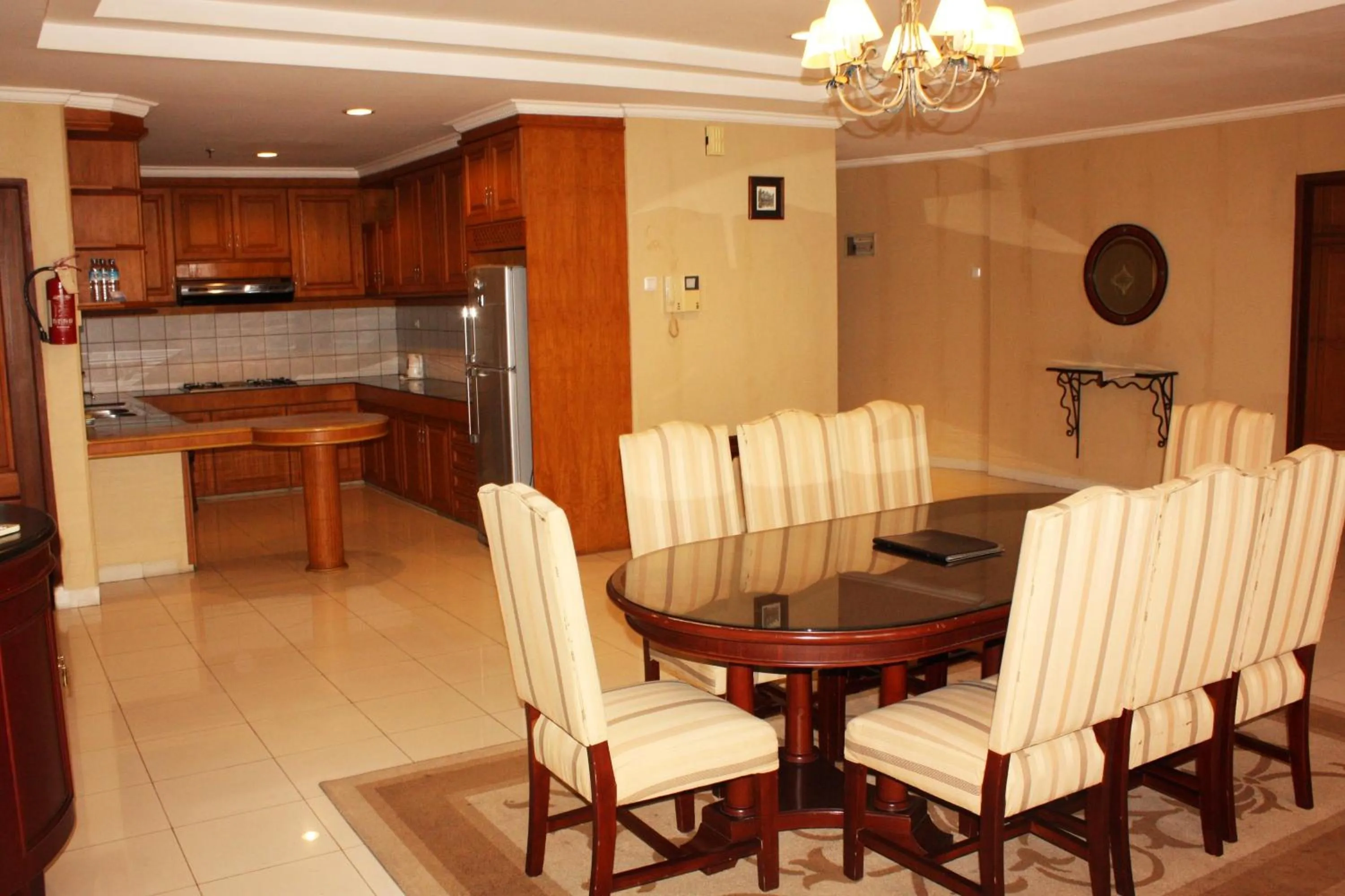Kitchen or kitchenette in Travellers Suites Serviced Apartments