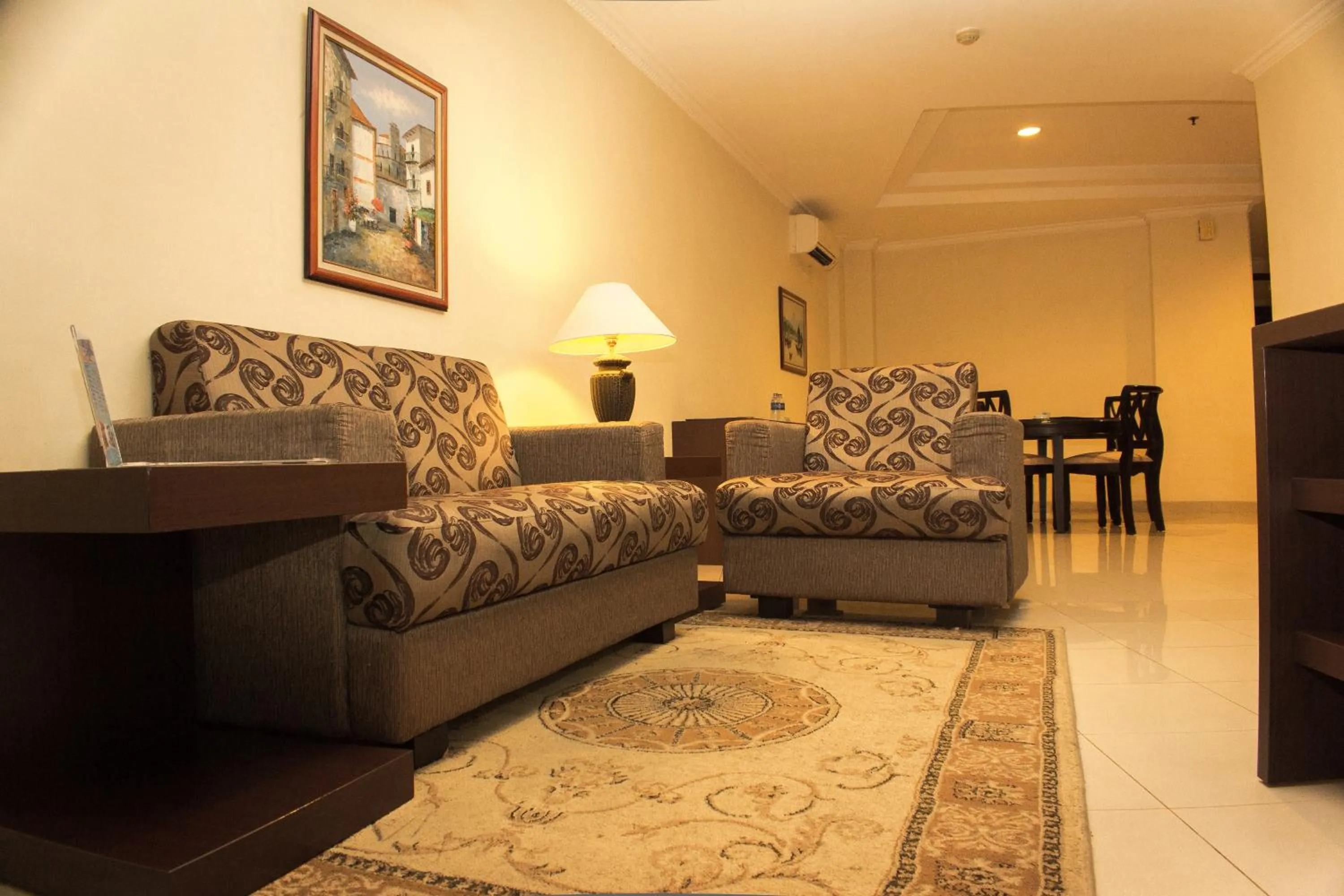 Living room in Travellers Suites Serviced Apartments