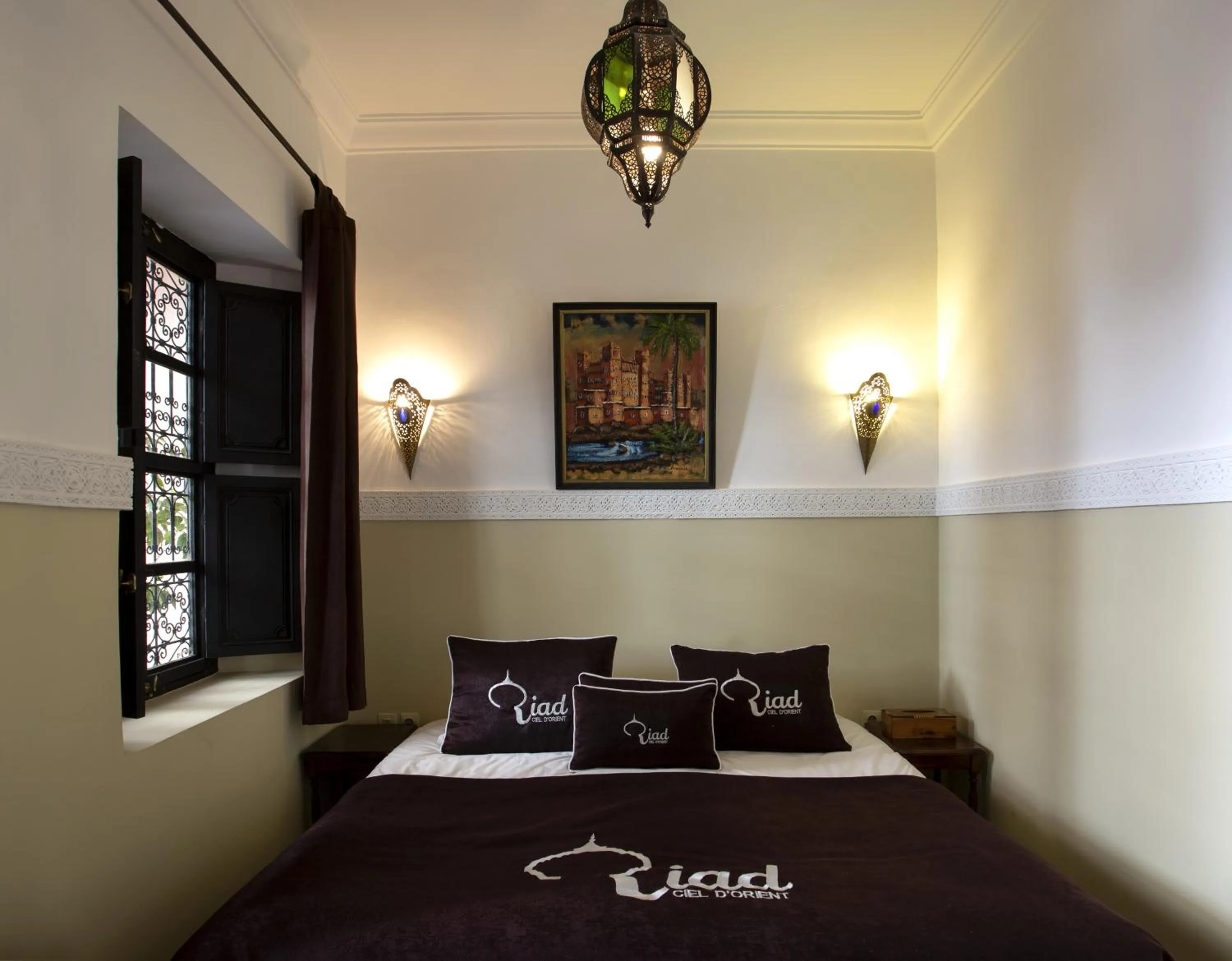Bed in Riad Ciel d'Orient