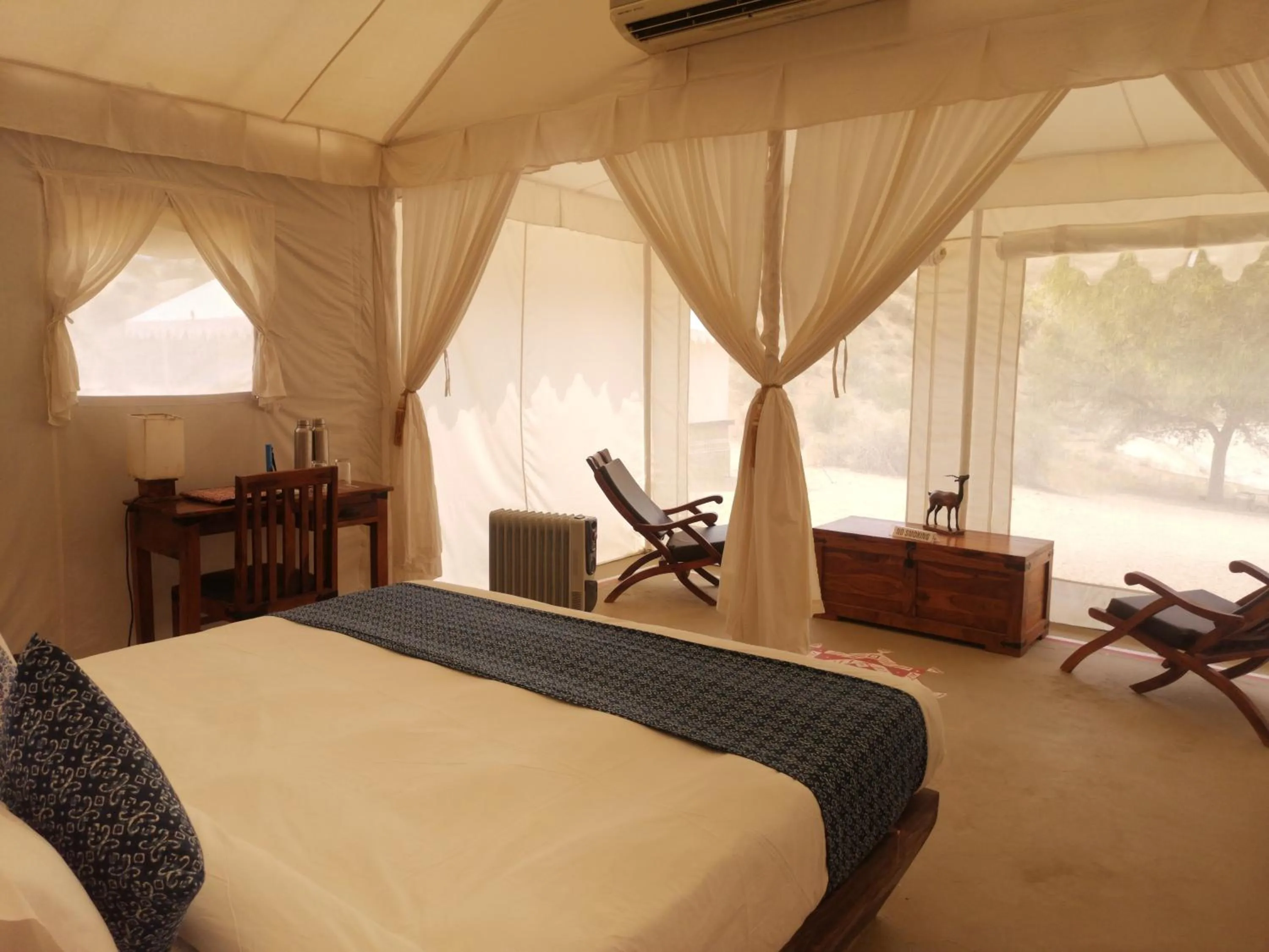 Bed in Dhora Desert Resort And Spa