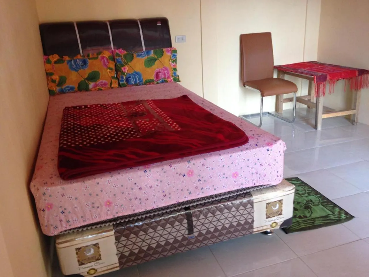 Bed in Aman's Guesthouse