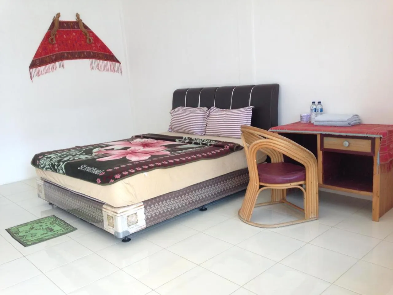 Bed in Aman's Guesthouse