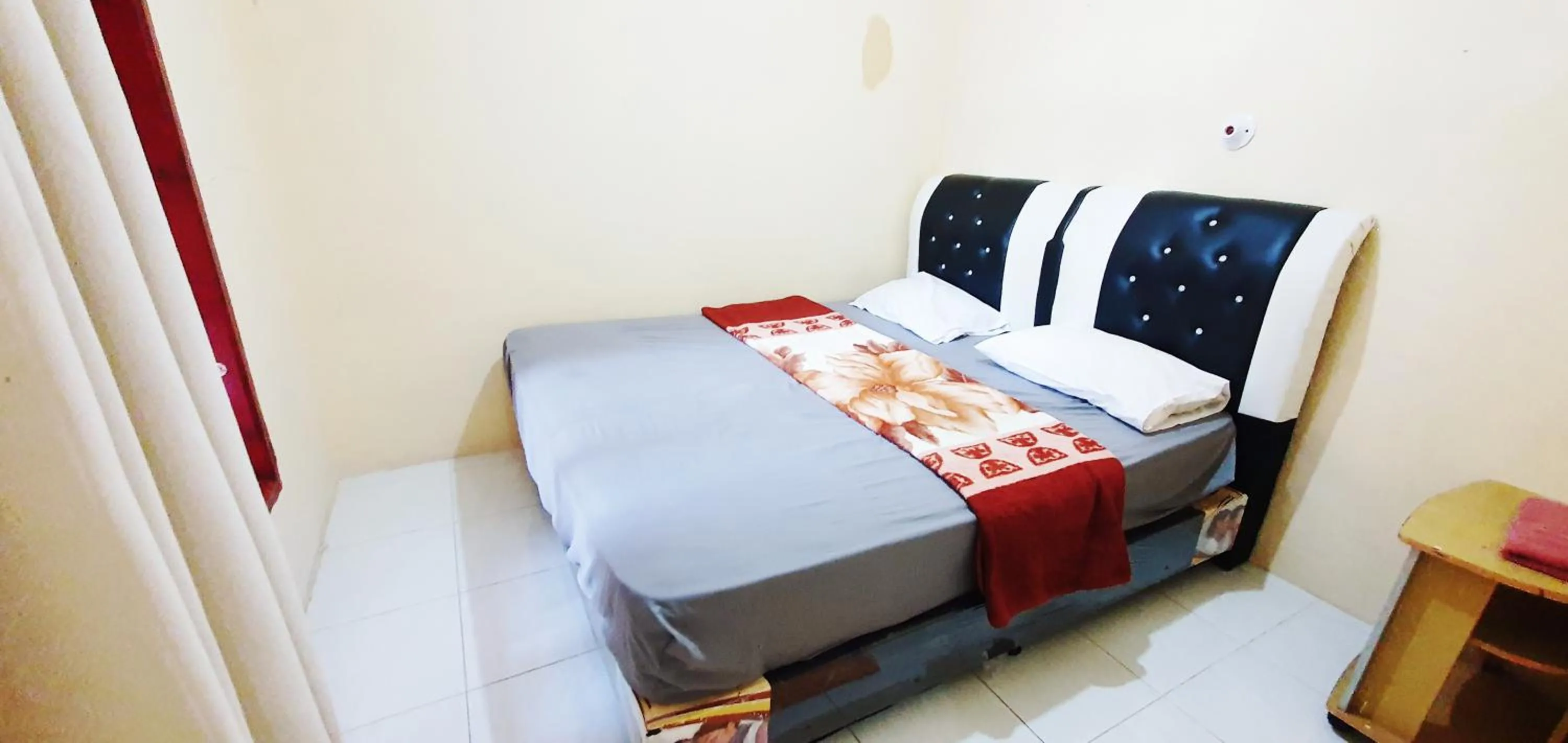 Bed in Aman's Guesthouse