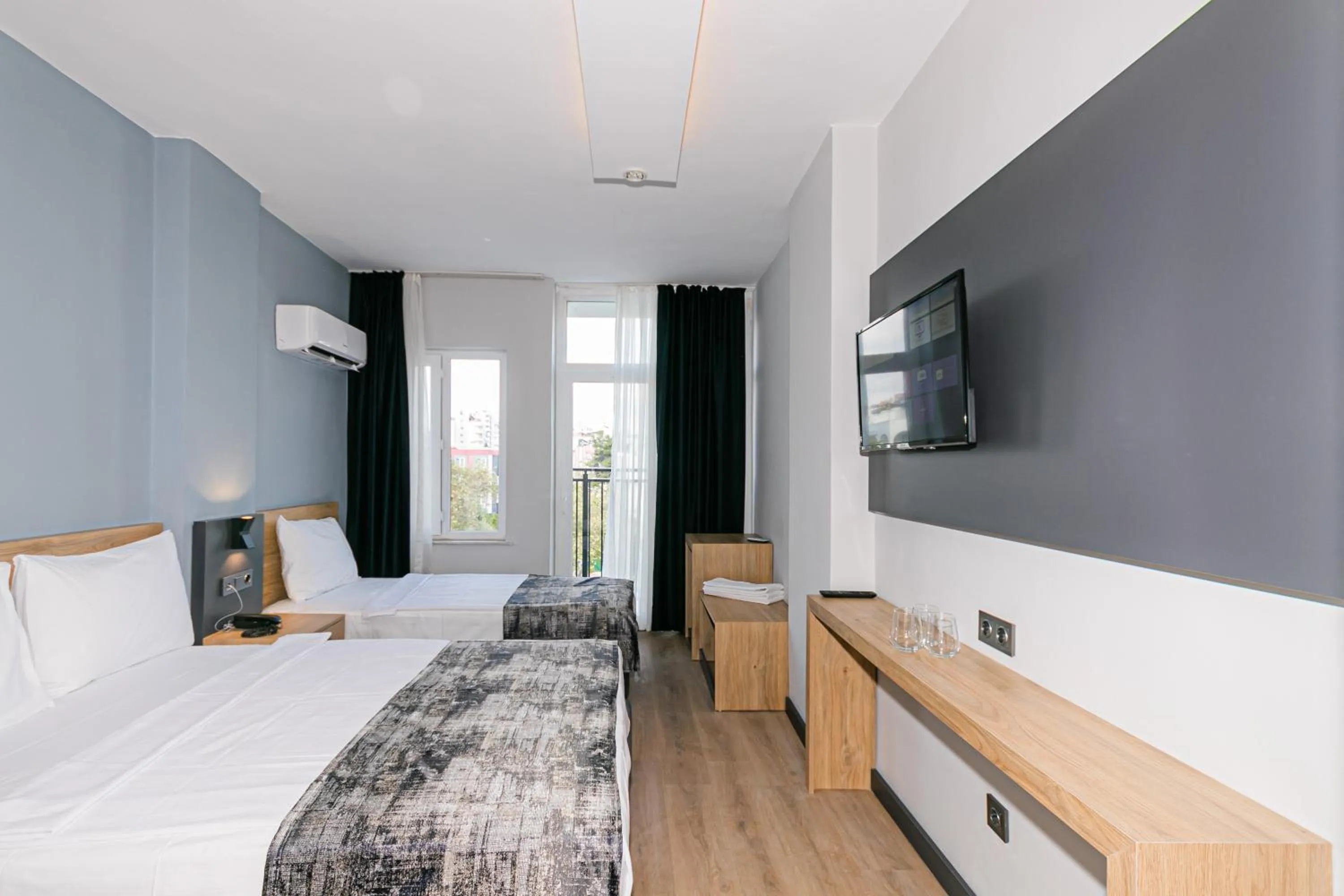 Bed in Lara World Hotel