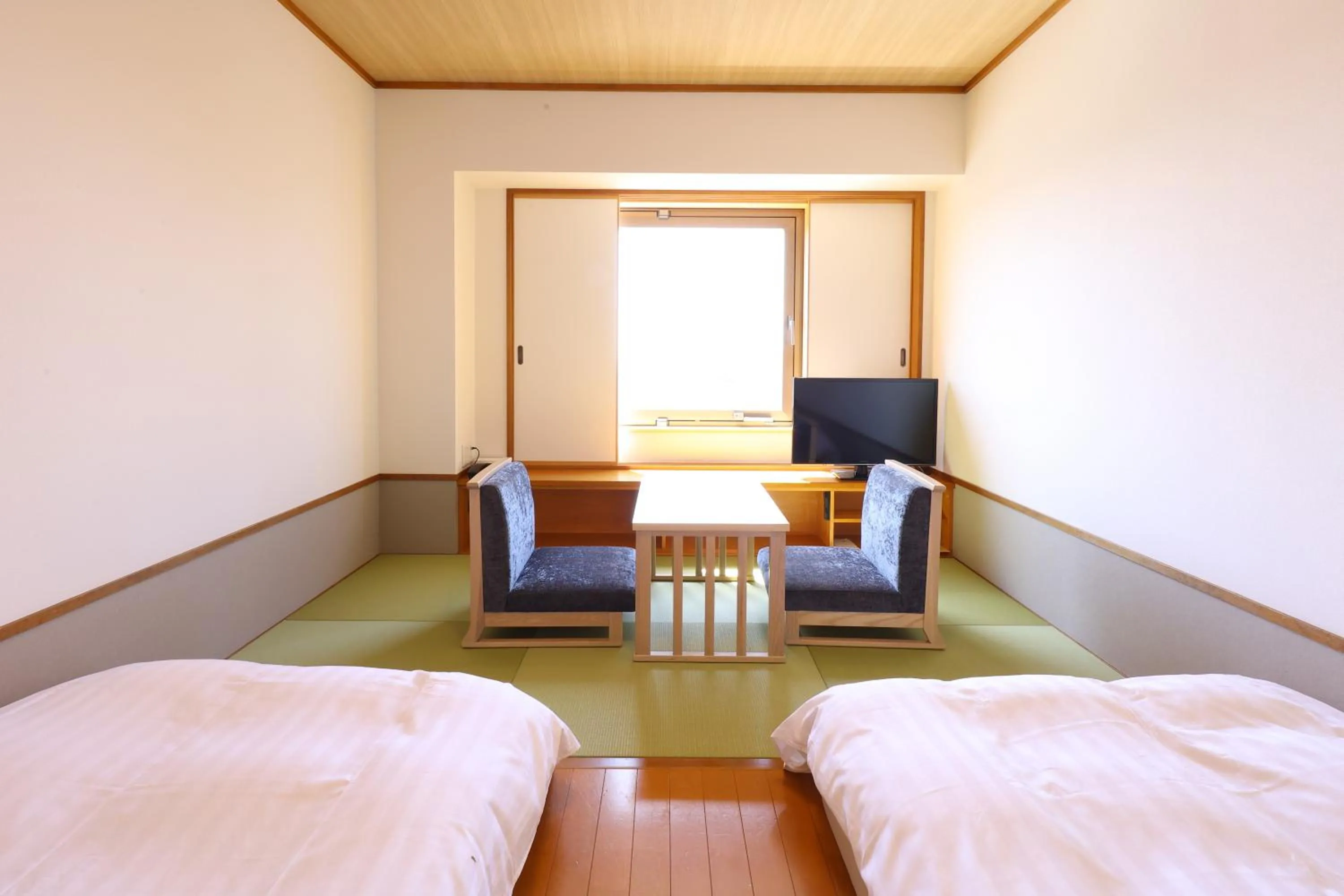Photo of the whole room, Bed in La Vista Kushirogawa Hotel Natural Hot Spring
