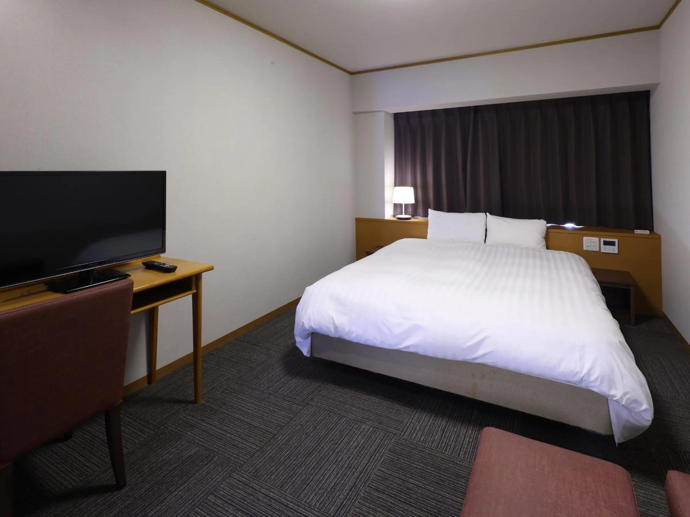 Bedroom, Bed in Dormy Inn PREMIUM Kushiro