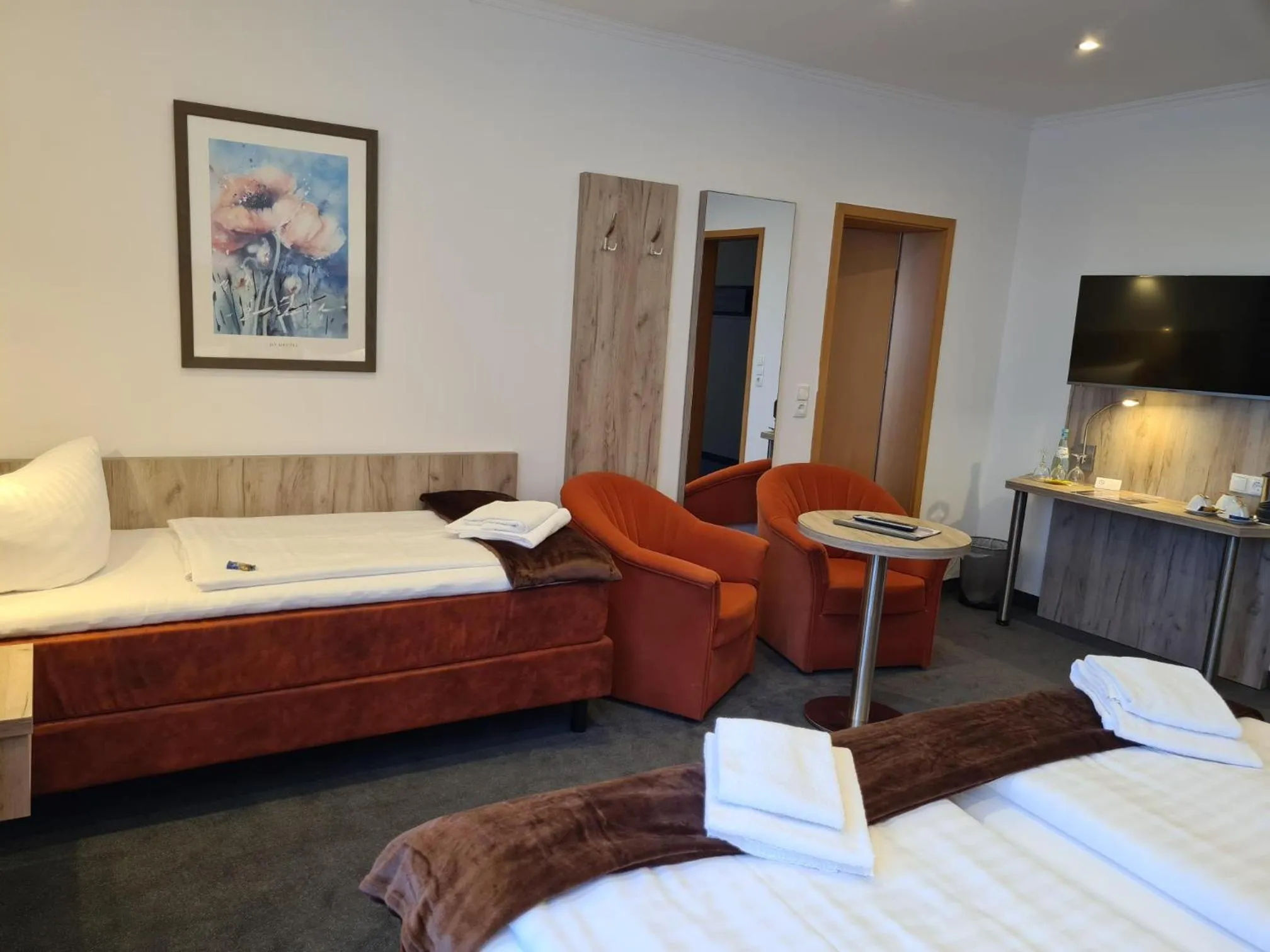 Photo of the whole room, Bed in WH Hotels Papenburg Zentrum