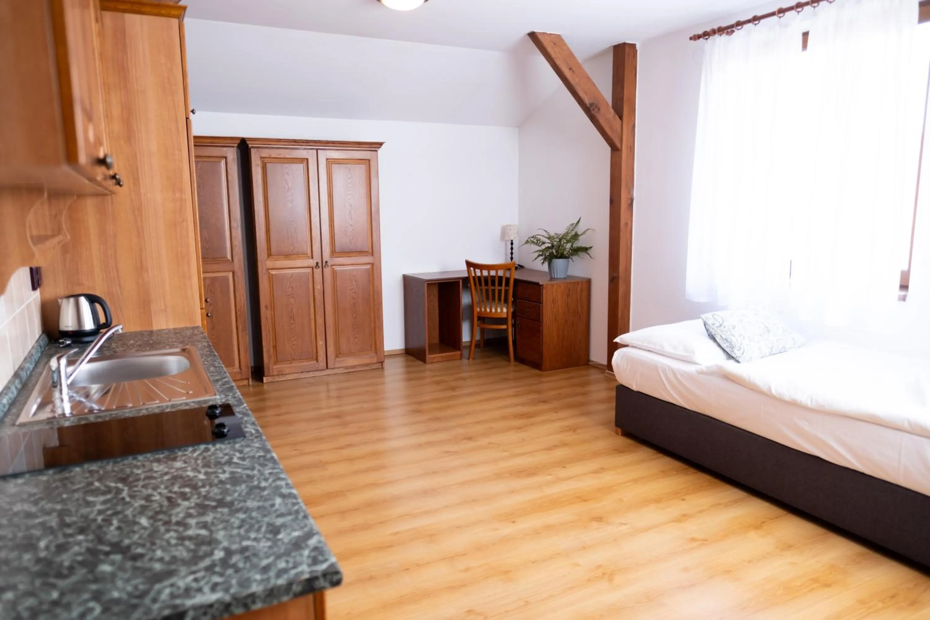 Bed in Club Apartments