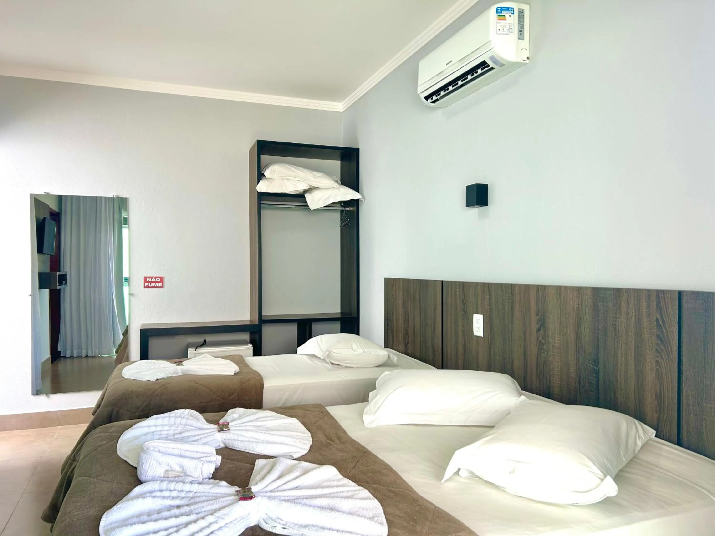 Bed in Pousada Rainha Dos Lagos