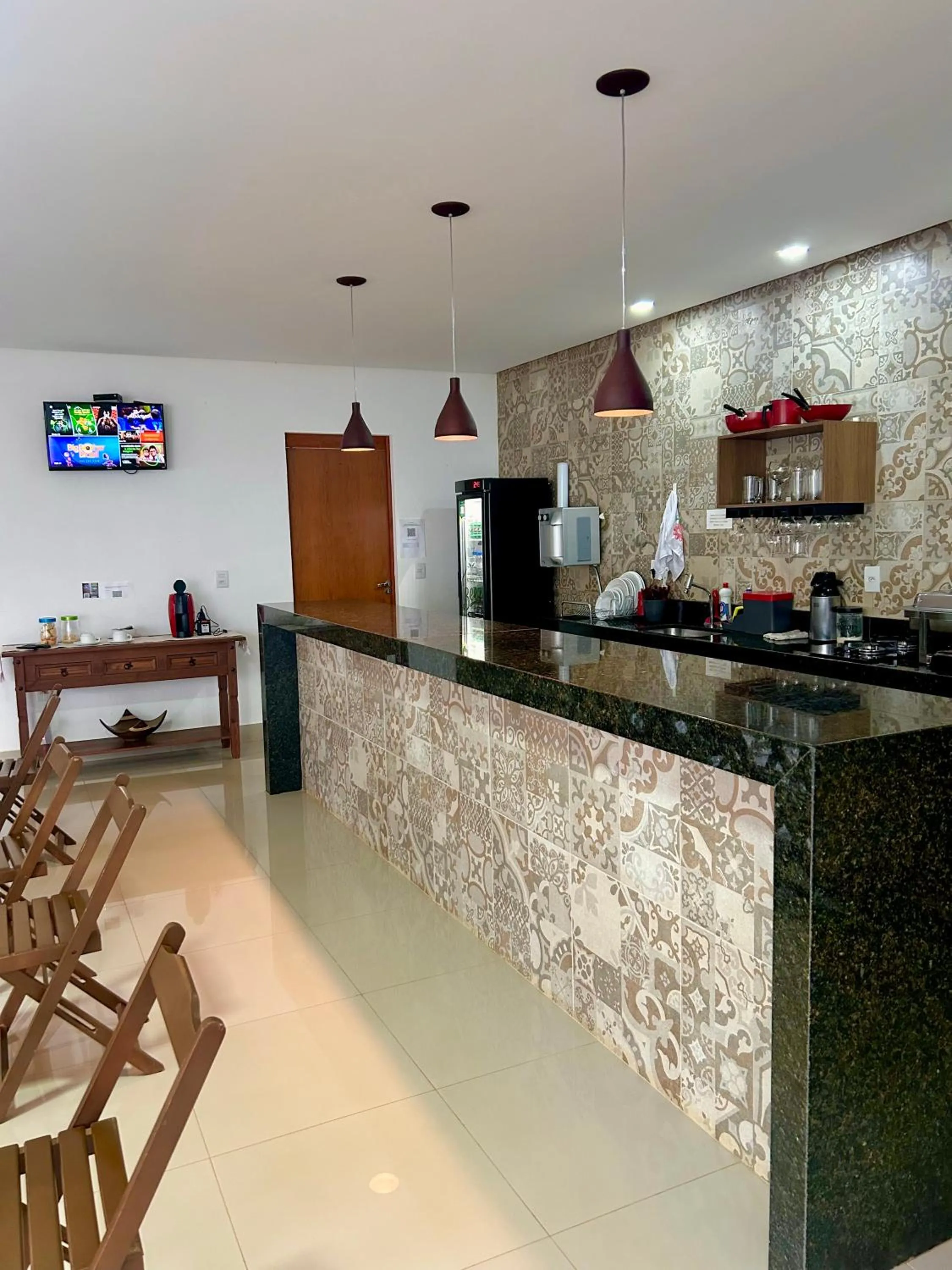 Kitchen or kitchenette in Pousada Rainha Dos Lagos