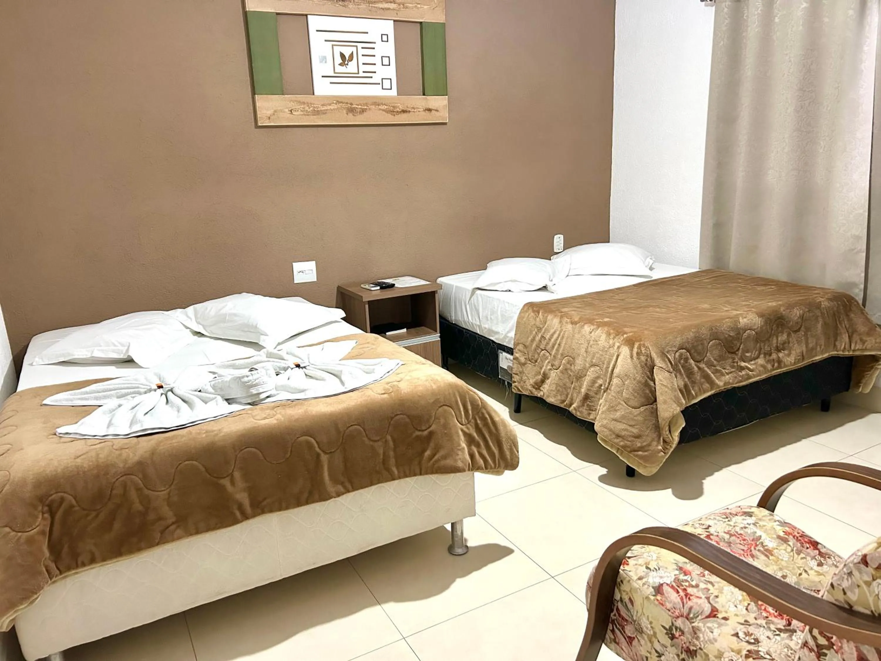 Photo of the whole room, Bed in Pousada Rainha Dos Lagos