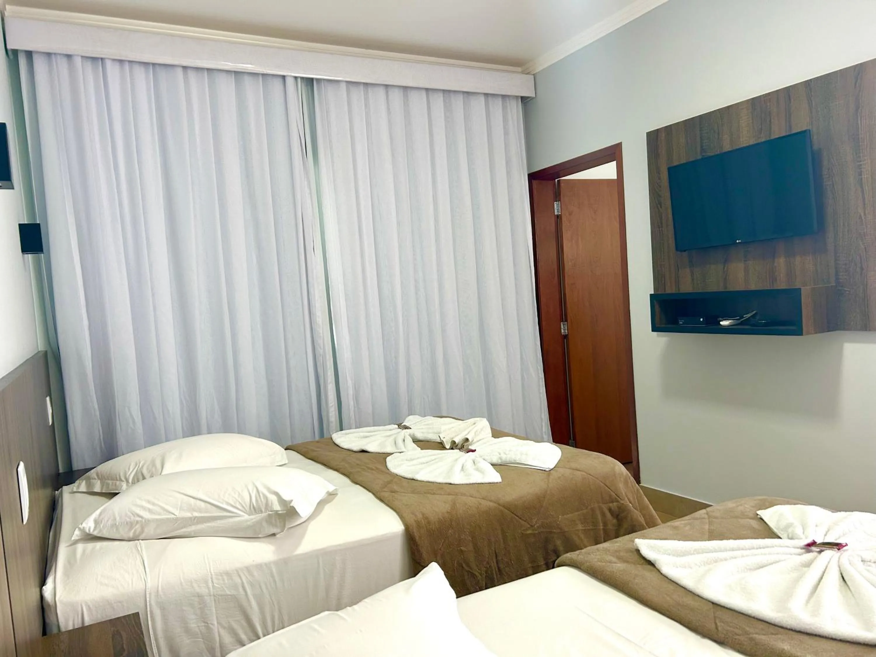 TV and multimedia, Bed in Pousada Rainha Dos Lagos