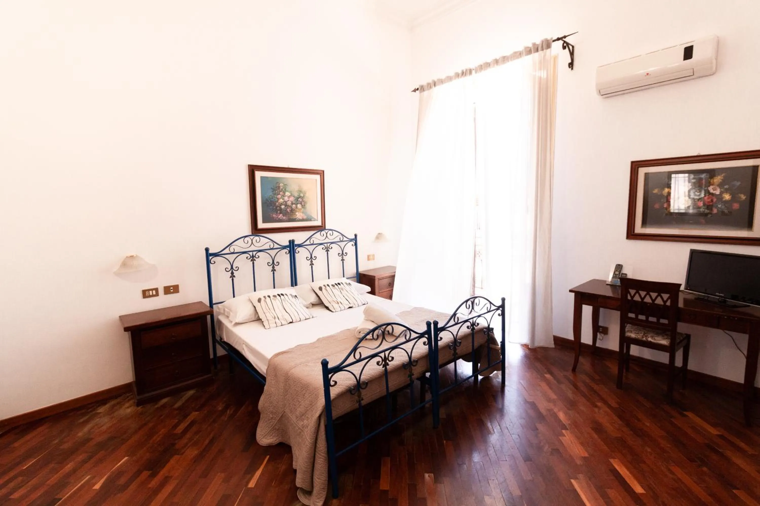 Bed in Hotel Concordia