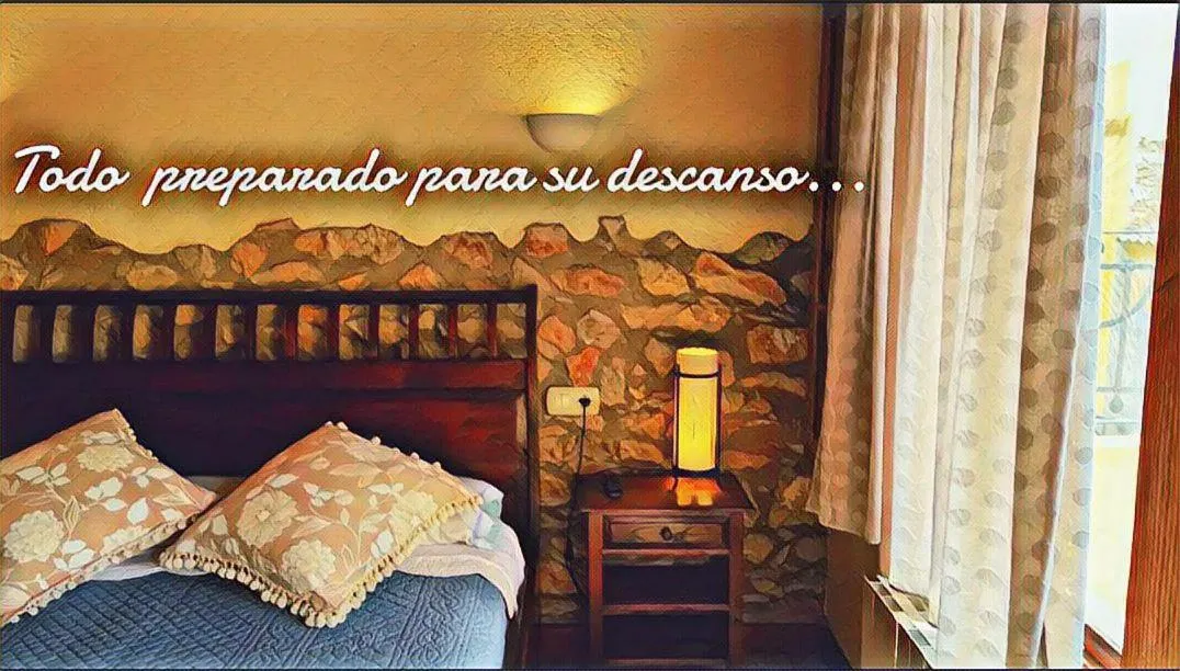 Bed in Vía Natura Hotel Rural