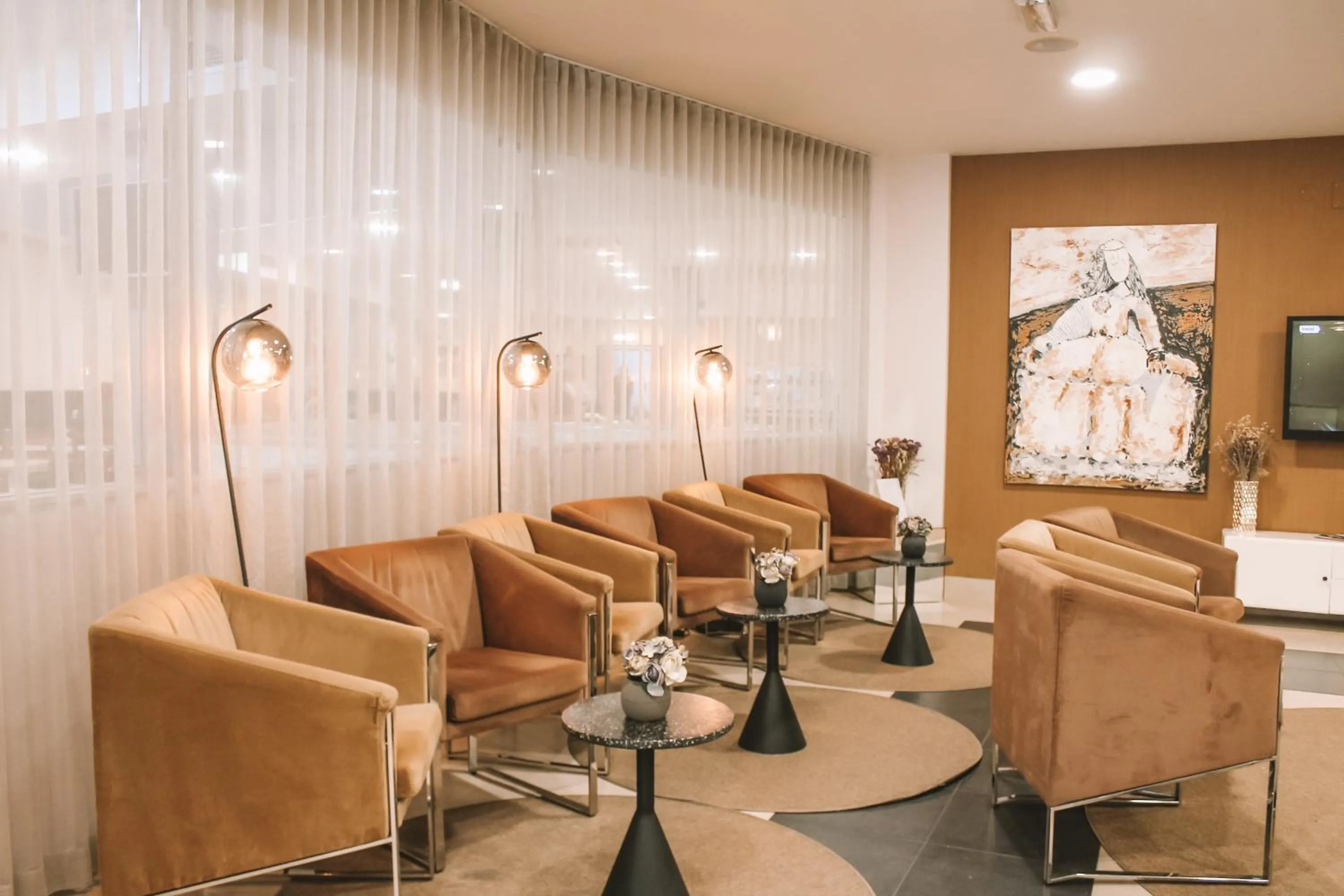 Lobby or reception in Vitoria Hotel