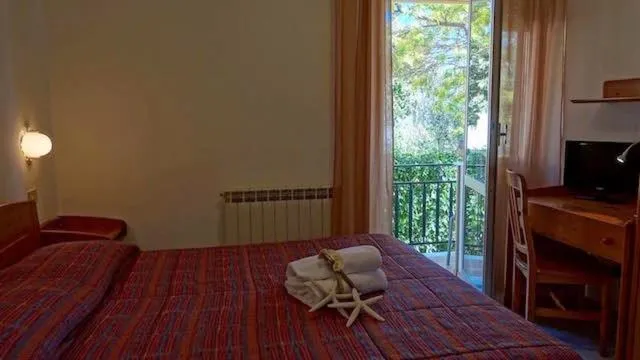 Photo of the whole room, Bed in Hotel Rosita