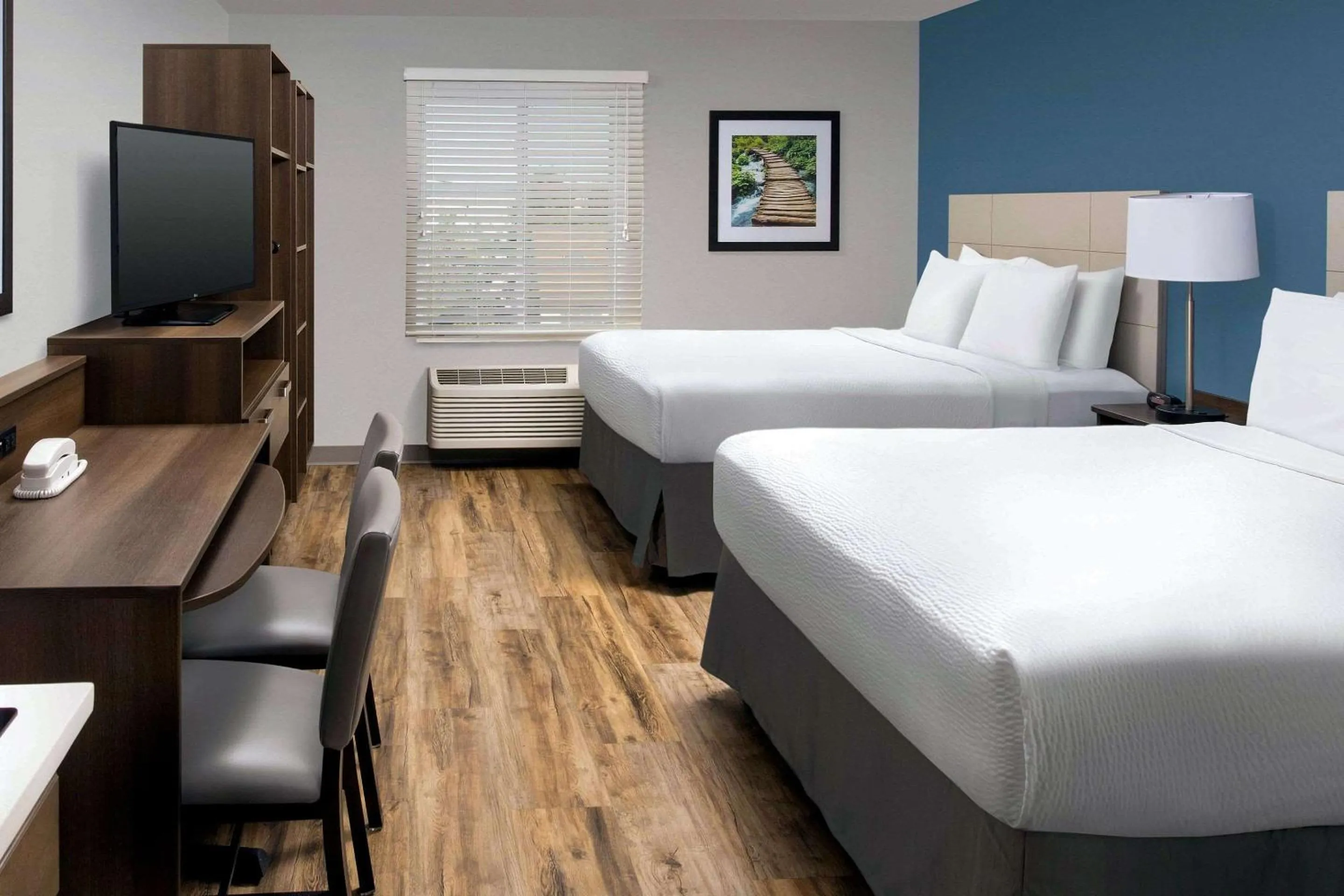 Photo of the whole room, Bed in WoodSpring Suites South Plainfield