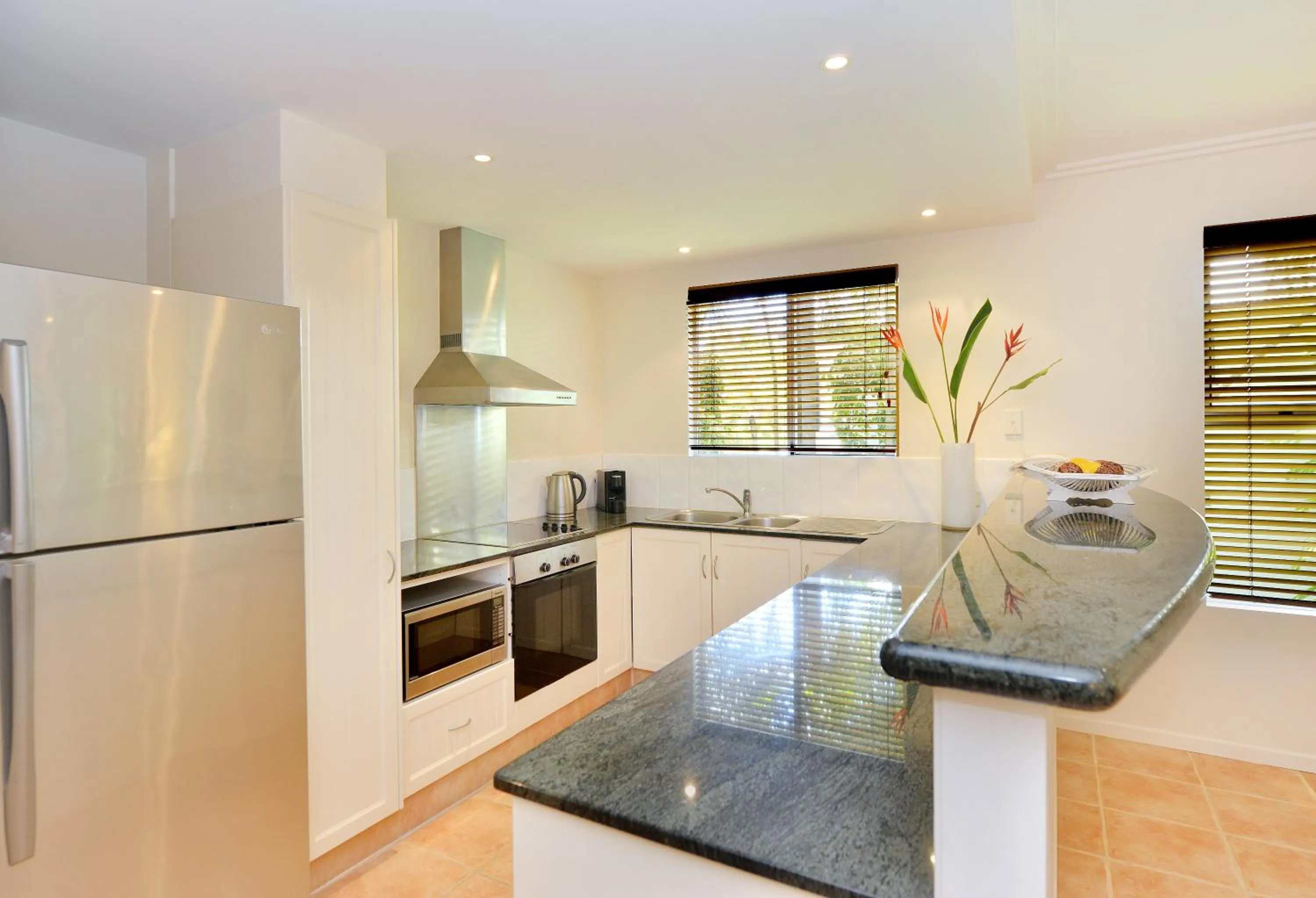Kitchen or kitchenette in Cayman Villas Port Douglas