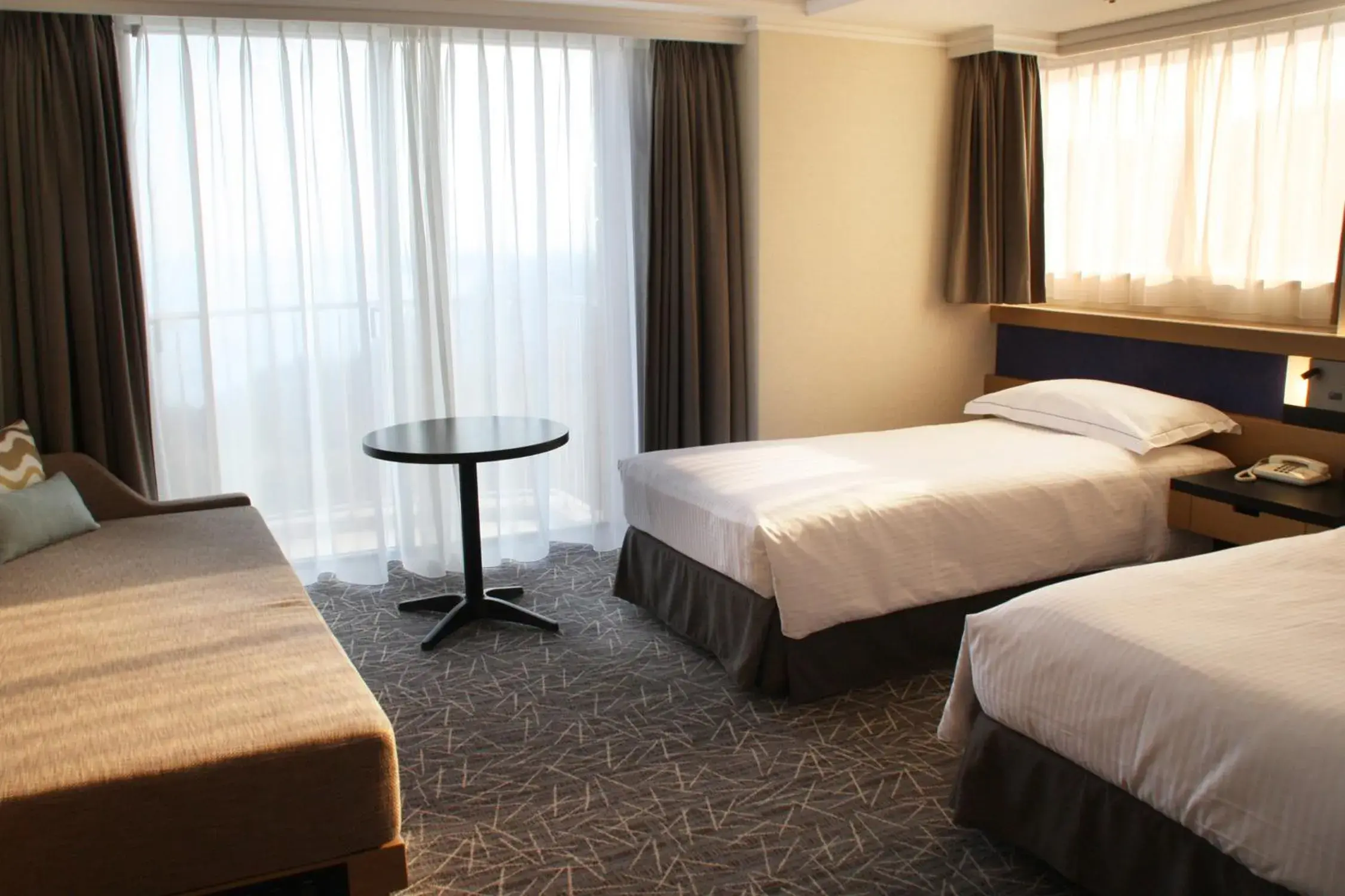 Seating area, Bed in Hilton Odawara Resort & Spa Seating area, Bed in Hilton Odawara Resort & Spa