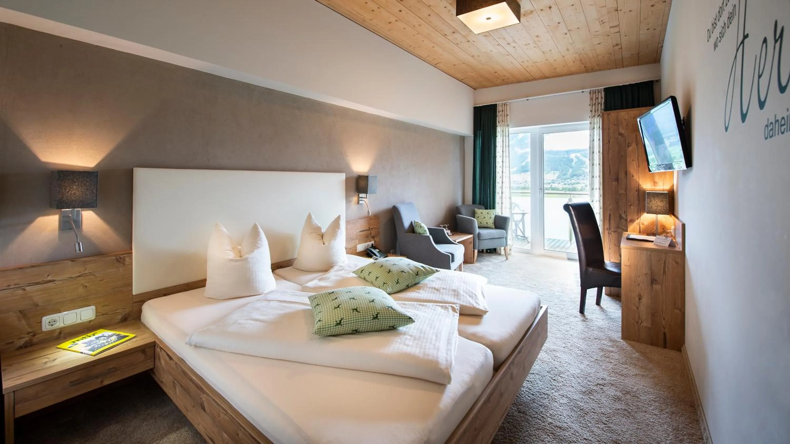 Seating area, Bed in Hotel Hubertushof
