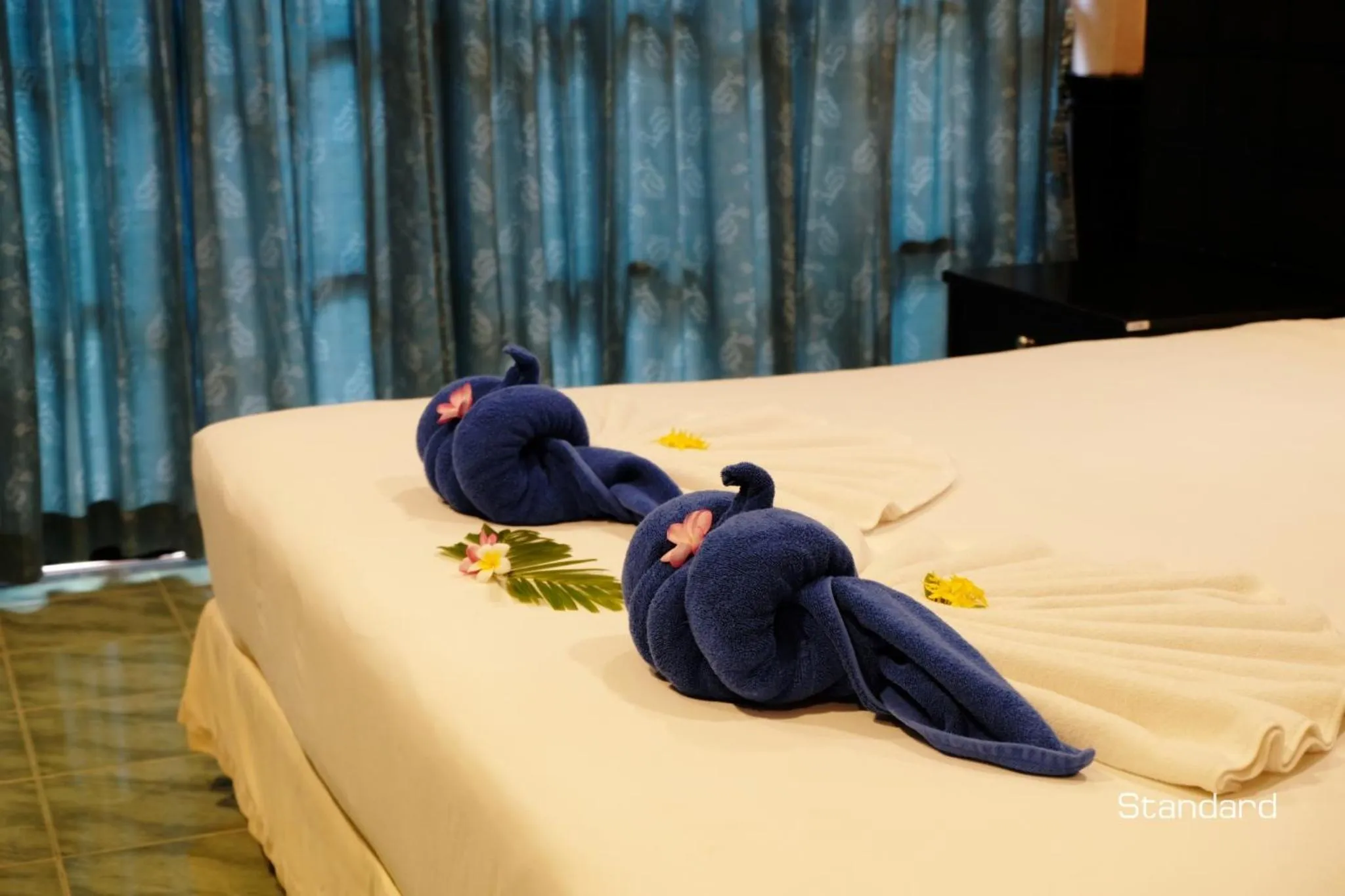 Bed in Andaman Lanta Resort - SHA Extra Plus