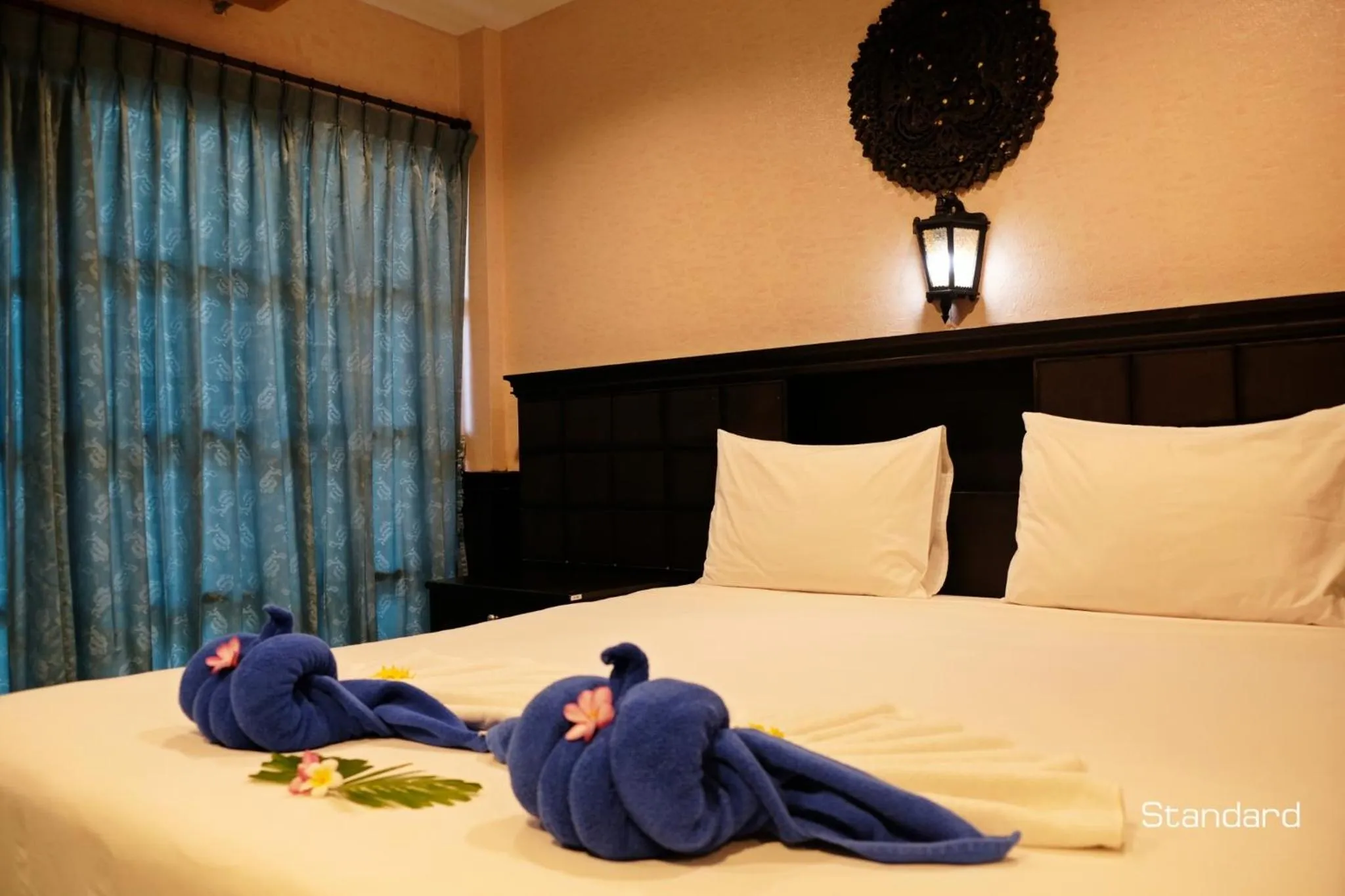 Bed in Andaman Lanta Resort - SHA Extra Plus