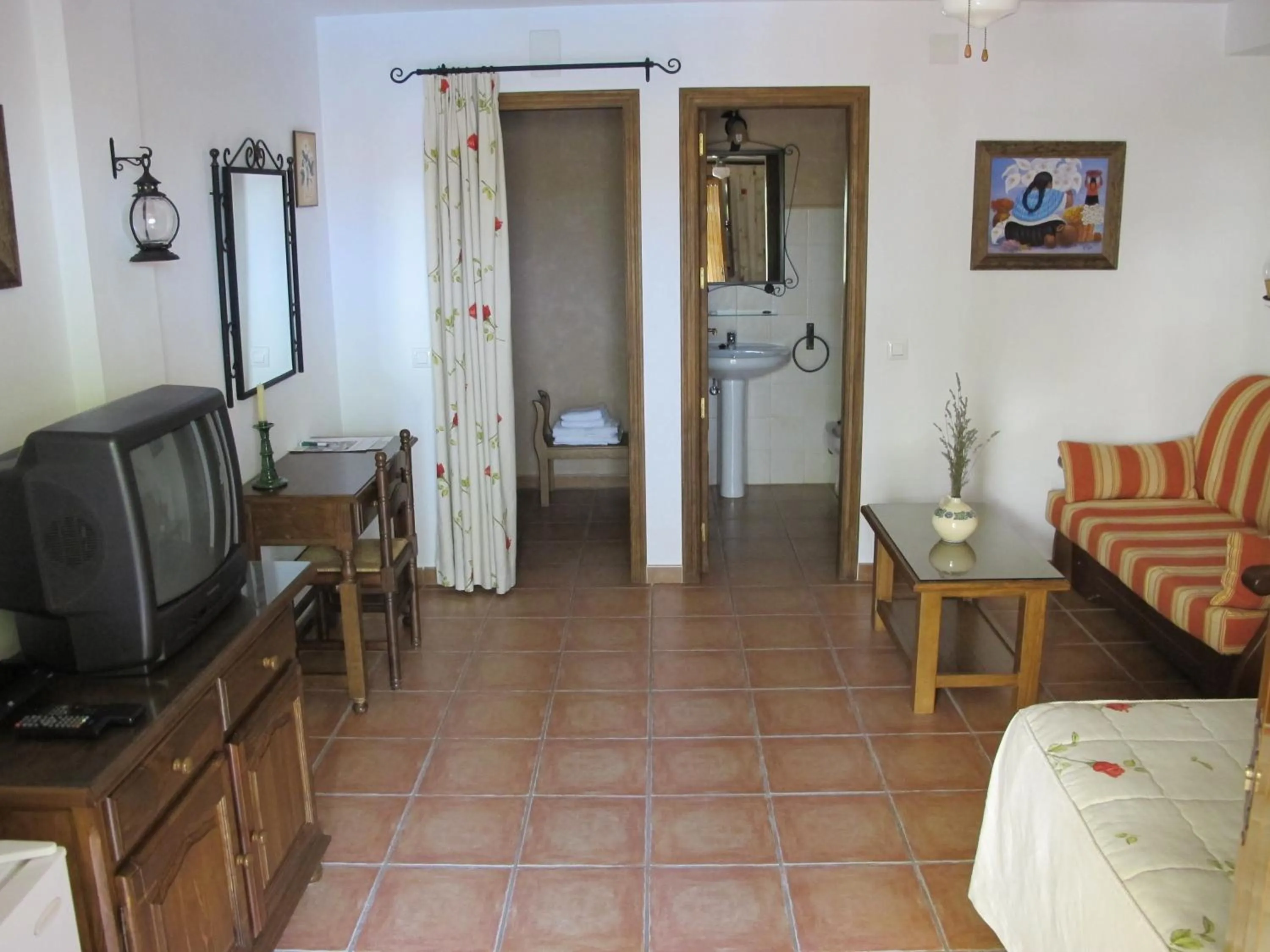 TV and multimedia in Apartamentos Valle del Guadalquivir