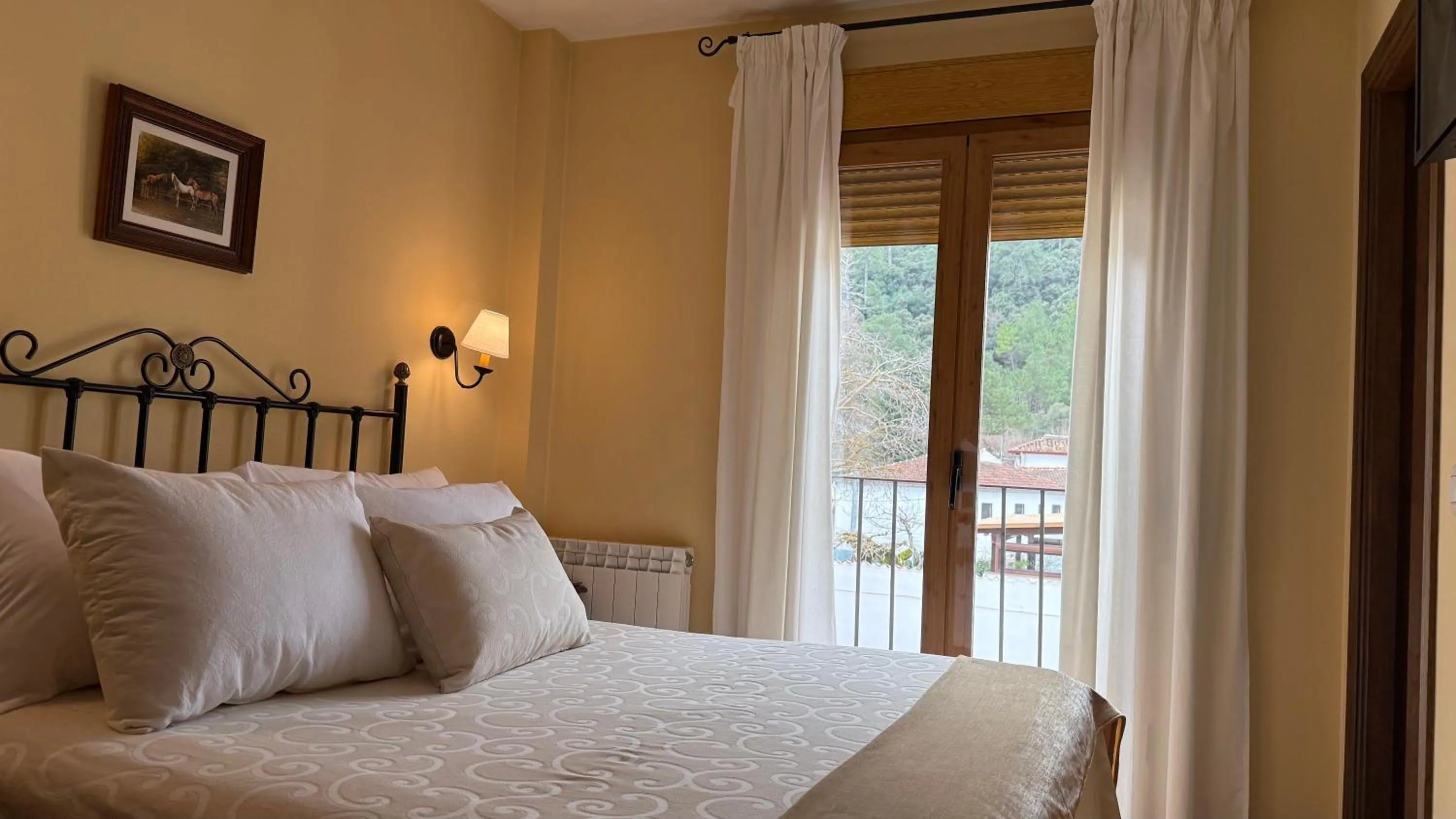 Bed in Apartamentos Valle del Guadalquivir