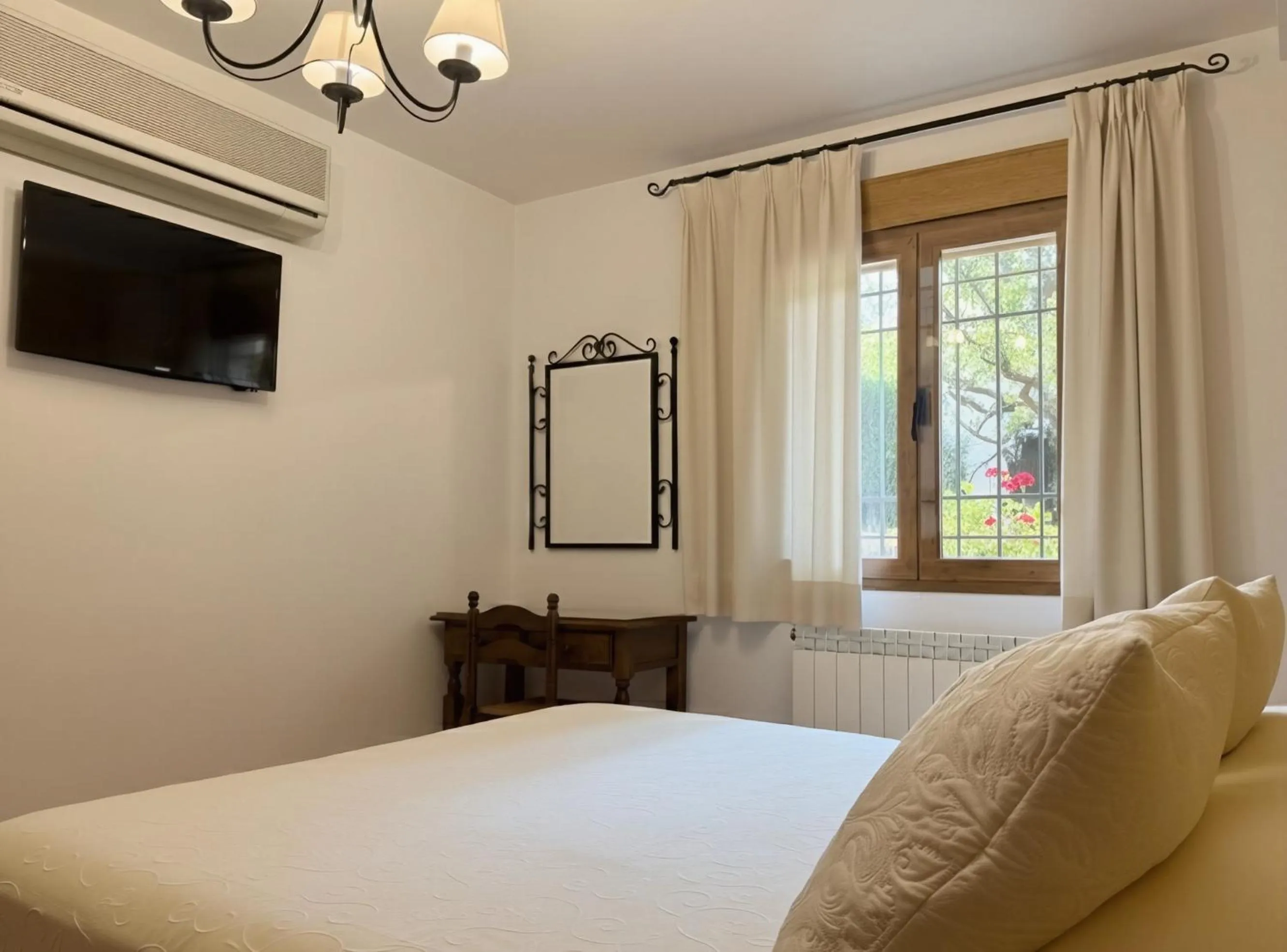 Bed in Apartamentos Valle del Guadalquivir