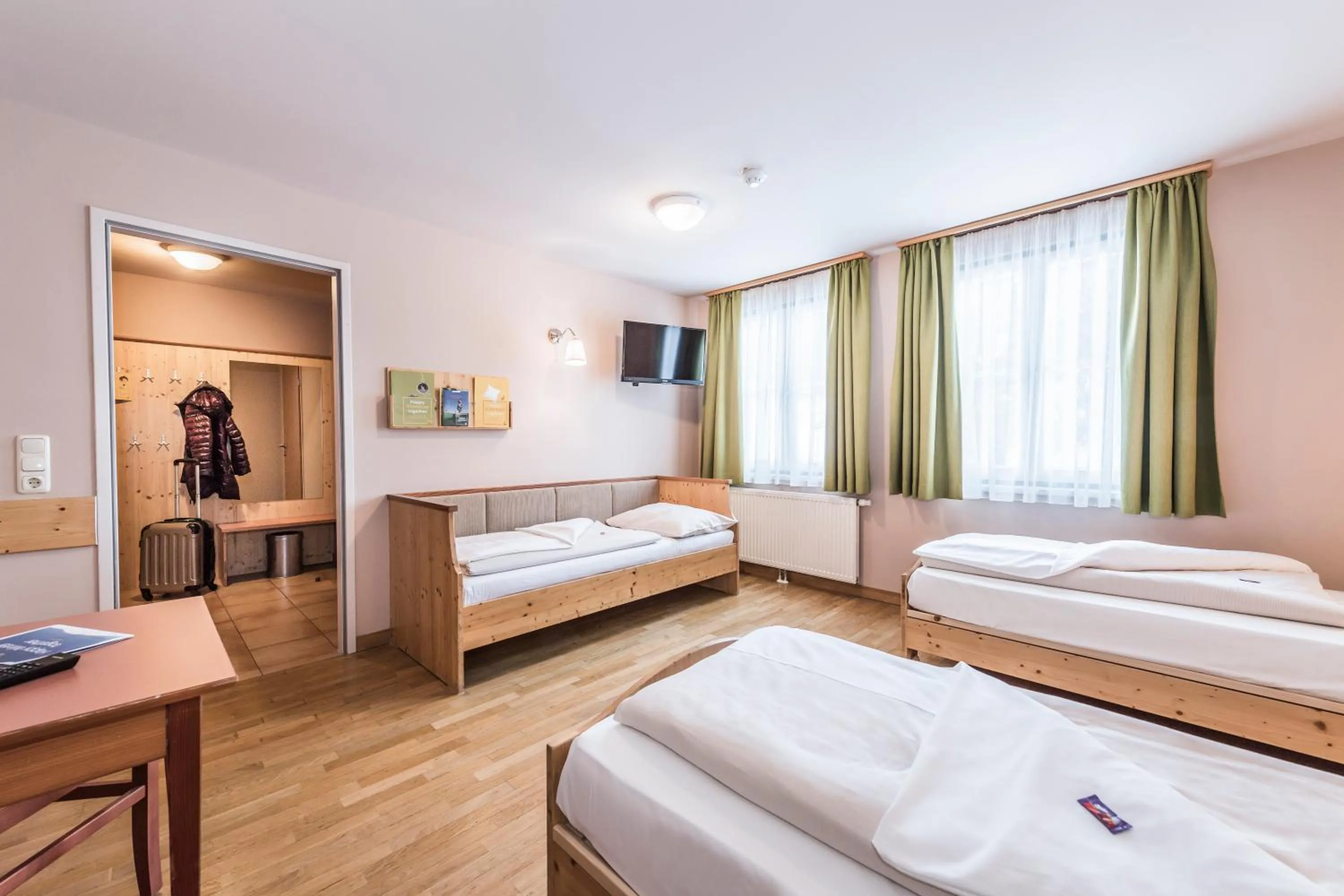 Bed in JUFA Hotel Grundlsee