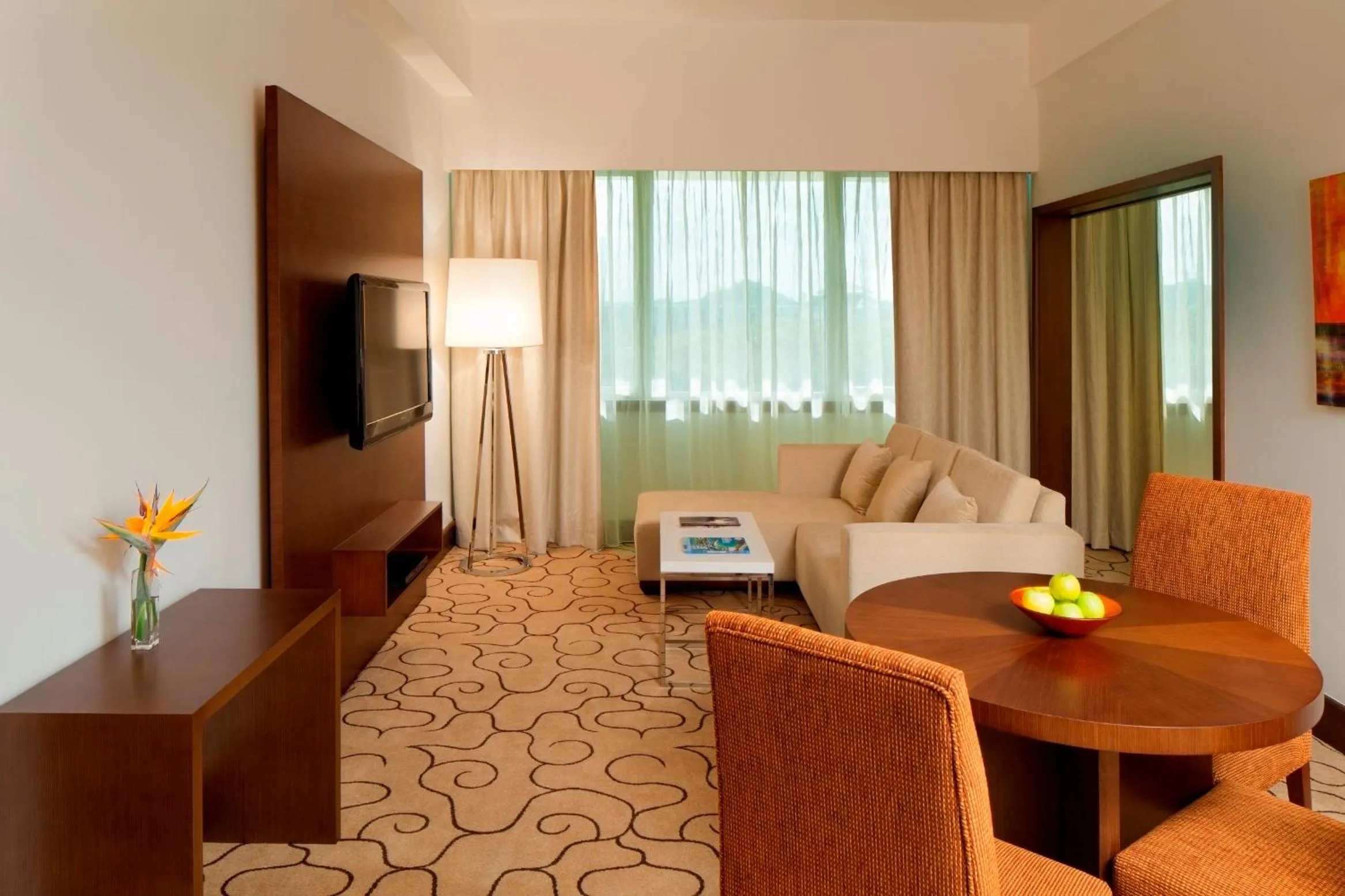 Living room, Bed in Radisson Hotel Brunei Darussalam