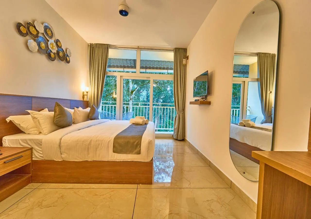 Premium Room in Areva Inn Plantation Resort Munnar with Pool by VOYE HOMES