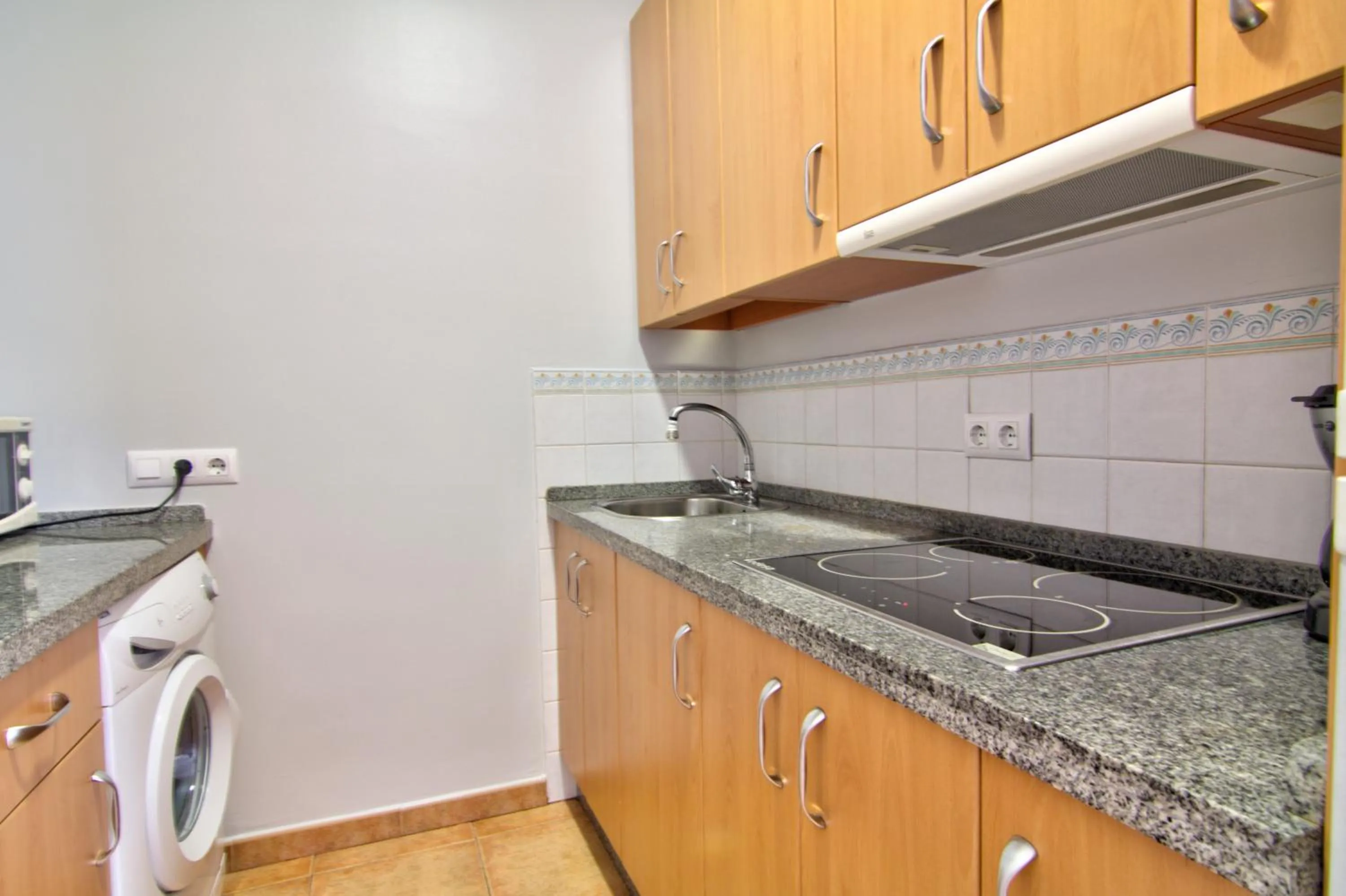 Kitchen or kitchenette in Apartamentos Centro 2 el Puerto
