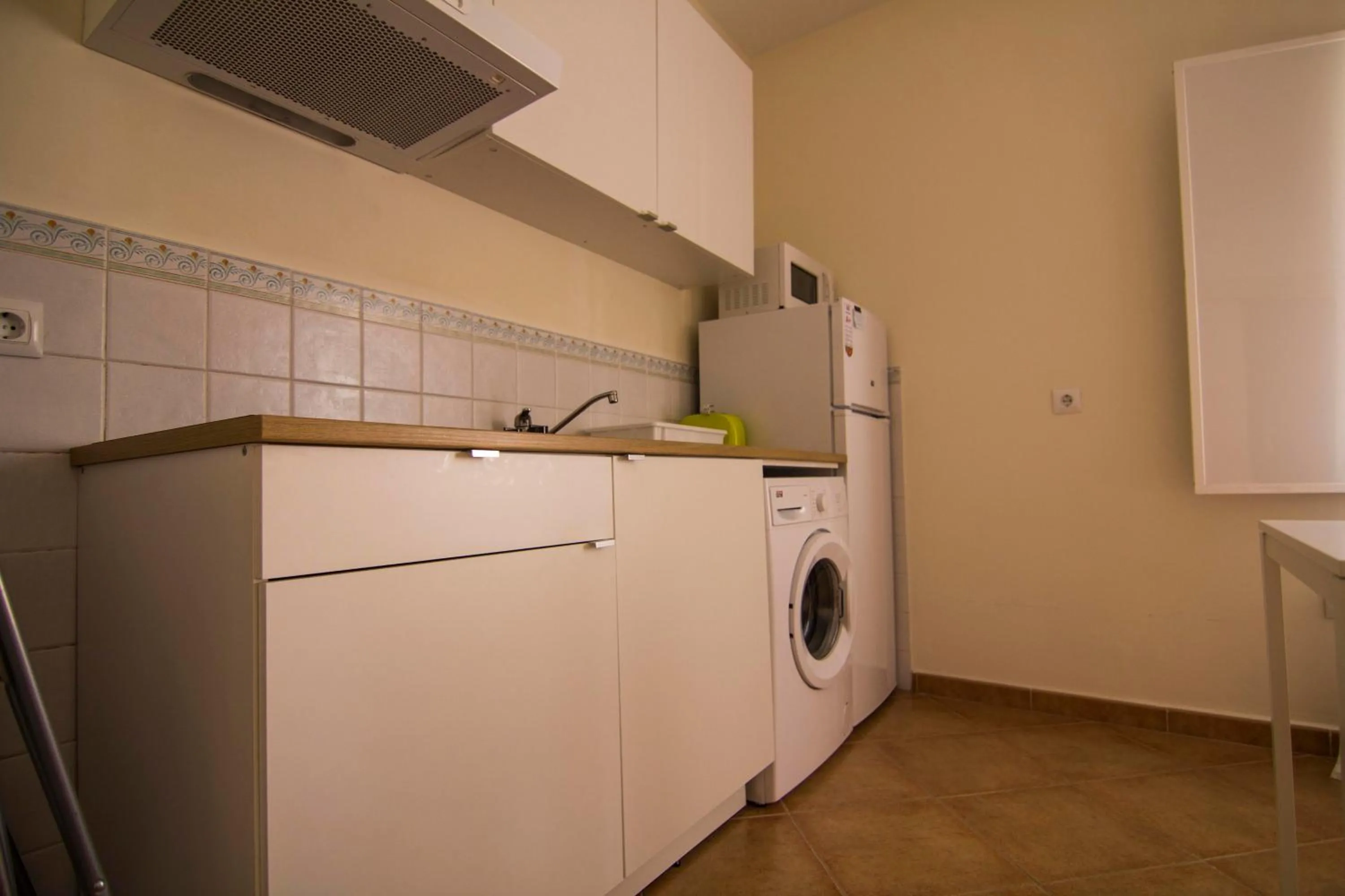 Kitchen or kitchenette in Apartamentos Centro 2 el Puerto
