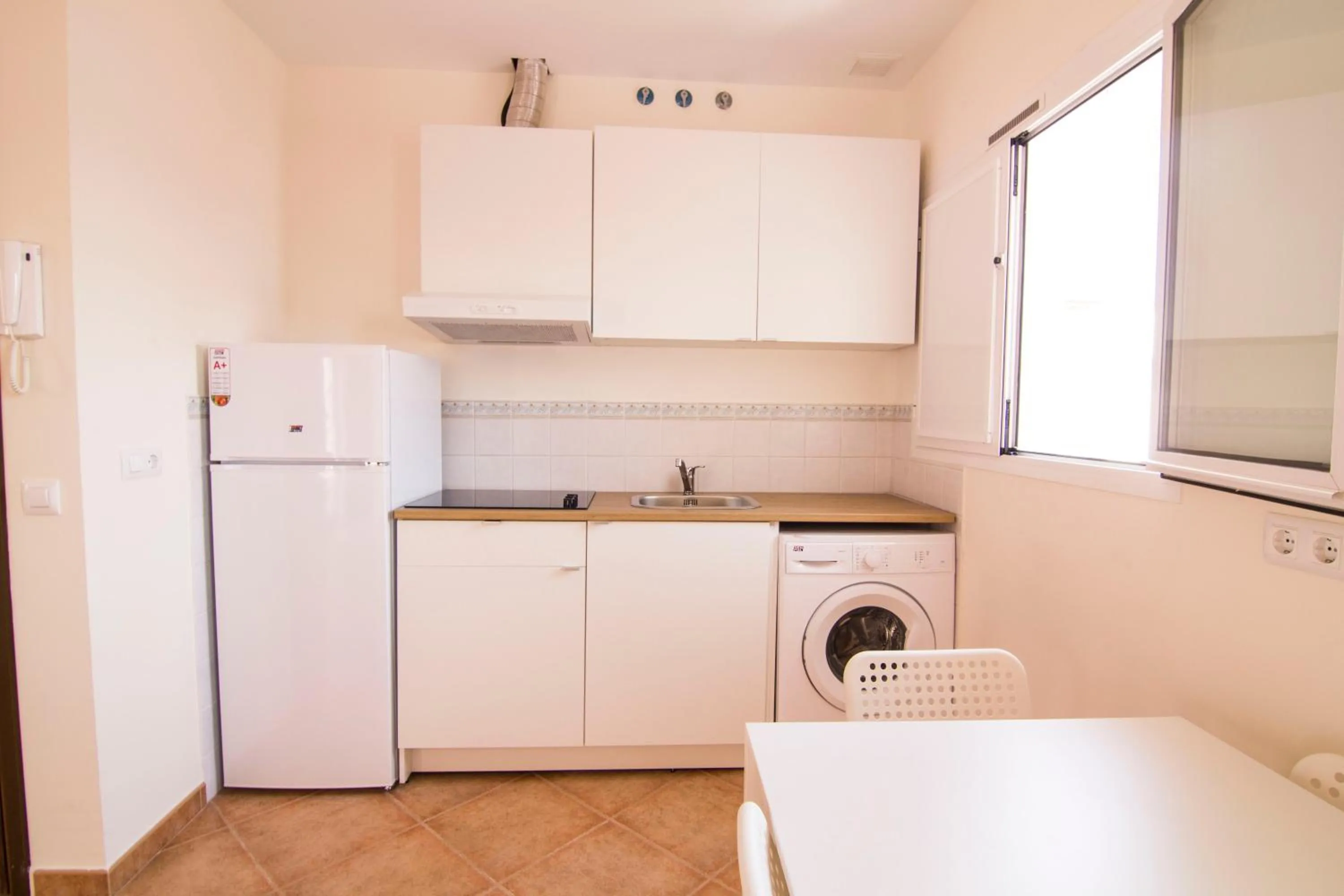 Kitchen or kitchenette in Apartamentos Centro 2 el Puerto
